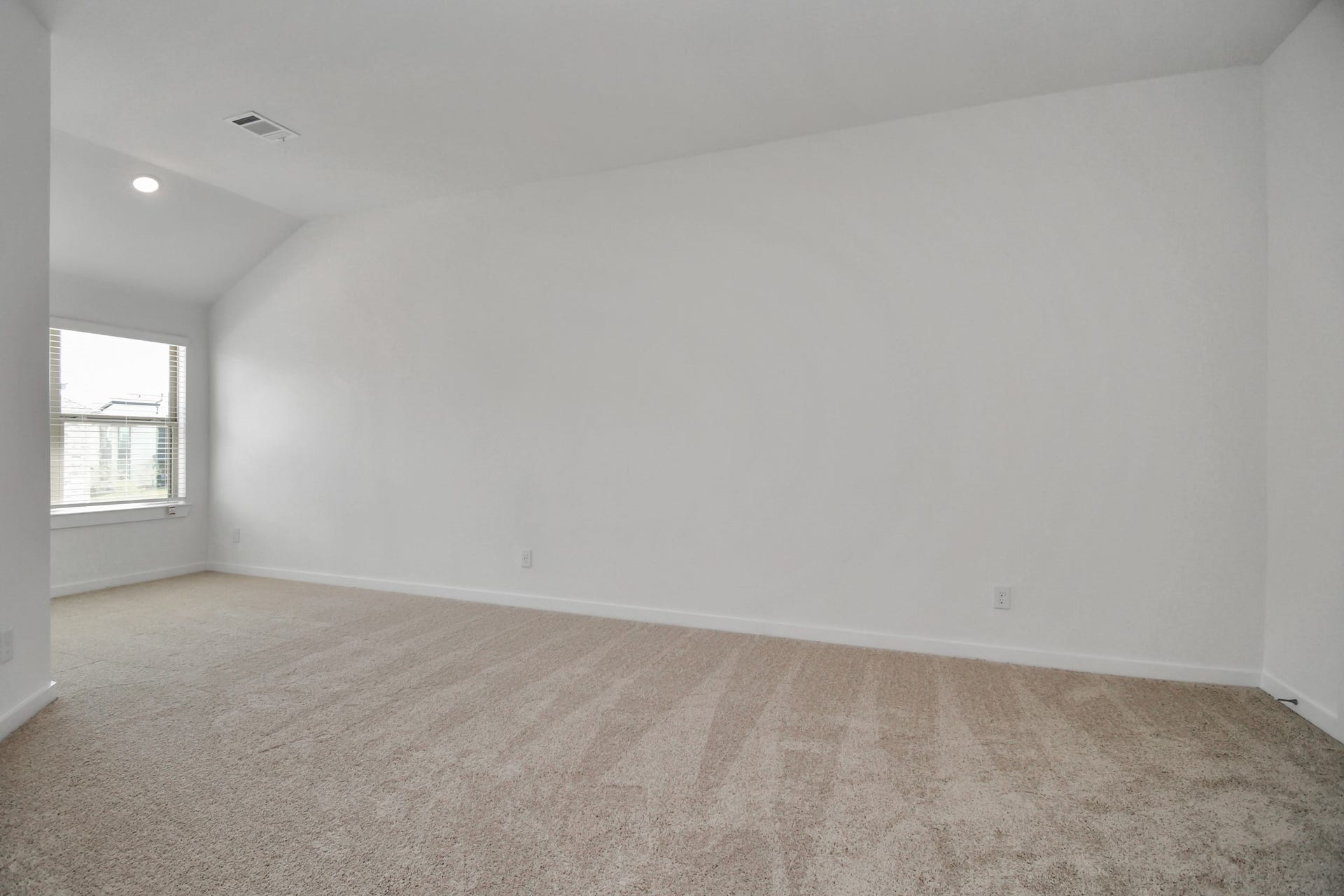 16506 Texas Hill Country Rd, Cypress, TX 77433 The spacious primary bedroom boasts plush carpet, providing a comfortable and inviting retreat.