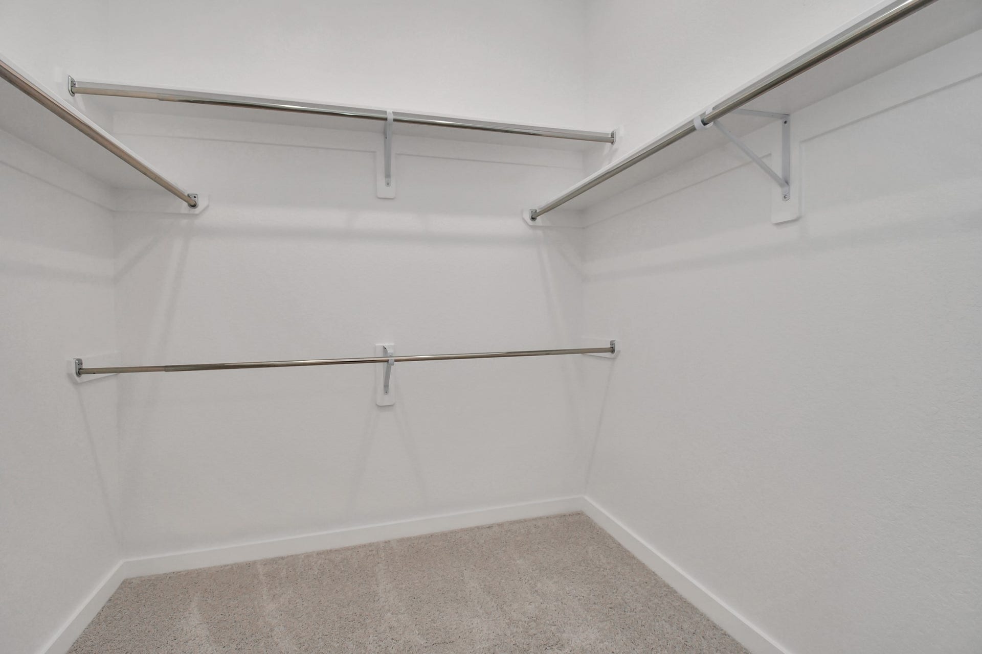 16506 Texas Hill Country Rd, Cypress, TX 77433 The primary bedroom includes a large walk-in closet, offering generous space.