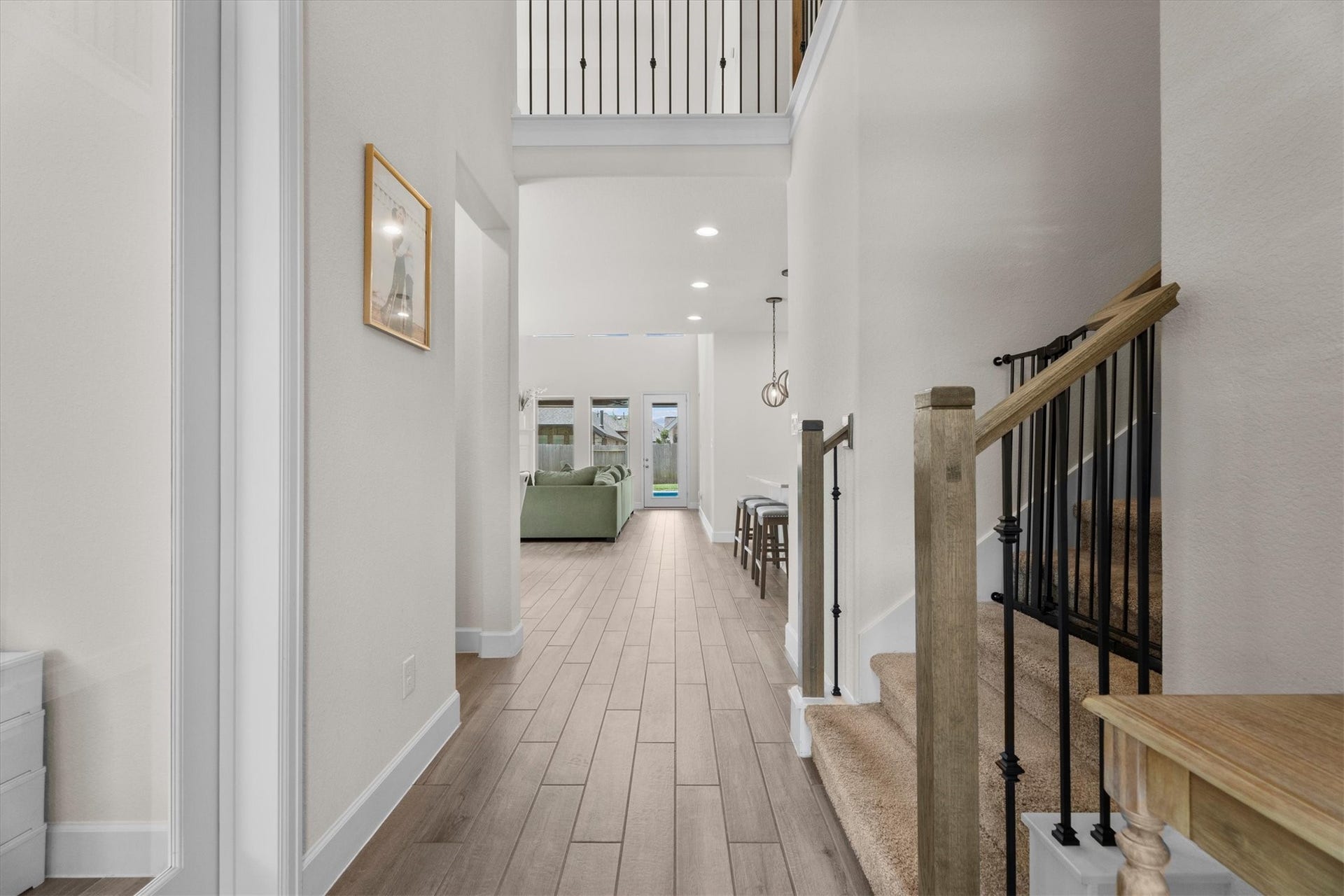 An inviting entry welcomes you into a home that feels bright, open, and effortlessly elegant.