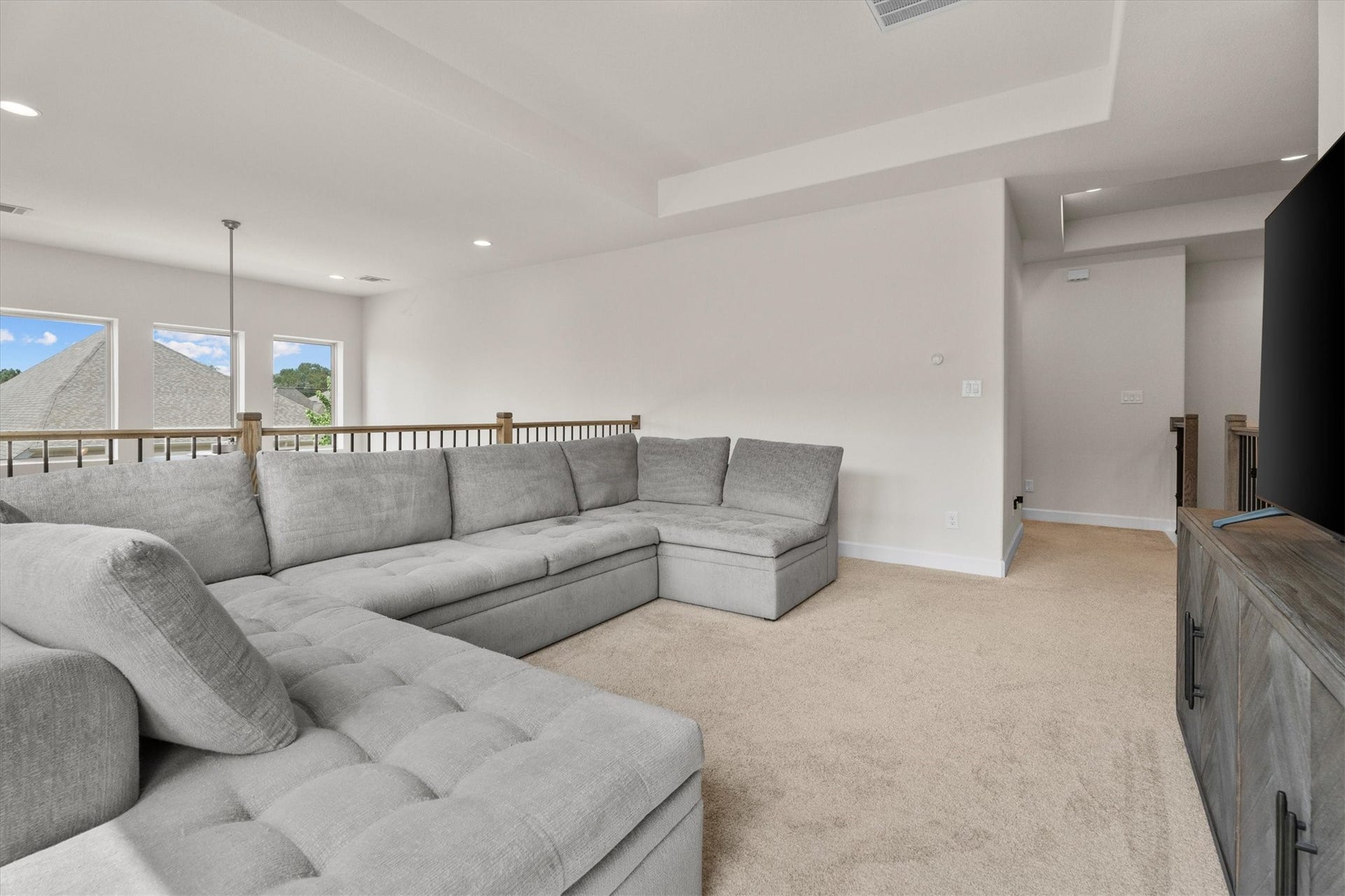 Whether it's game day, homework, or family movie night, this flexible space is ready for it all.