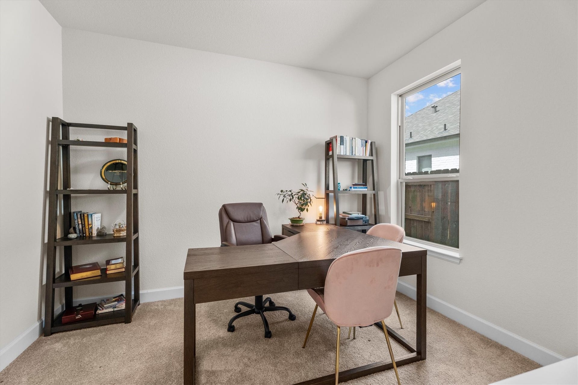Conveniently located downstairs, this bedroom is ideal for overnight guests, a second office, multigenerational living, or a nursery.