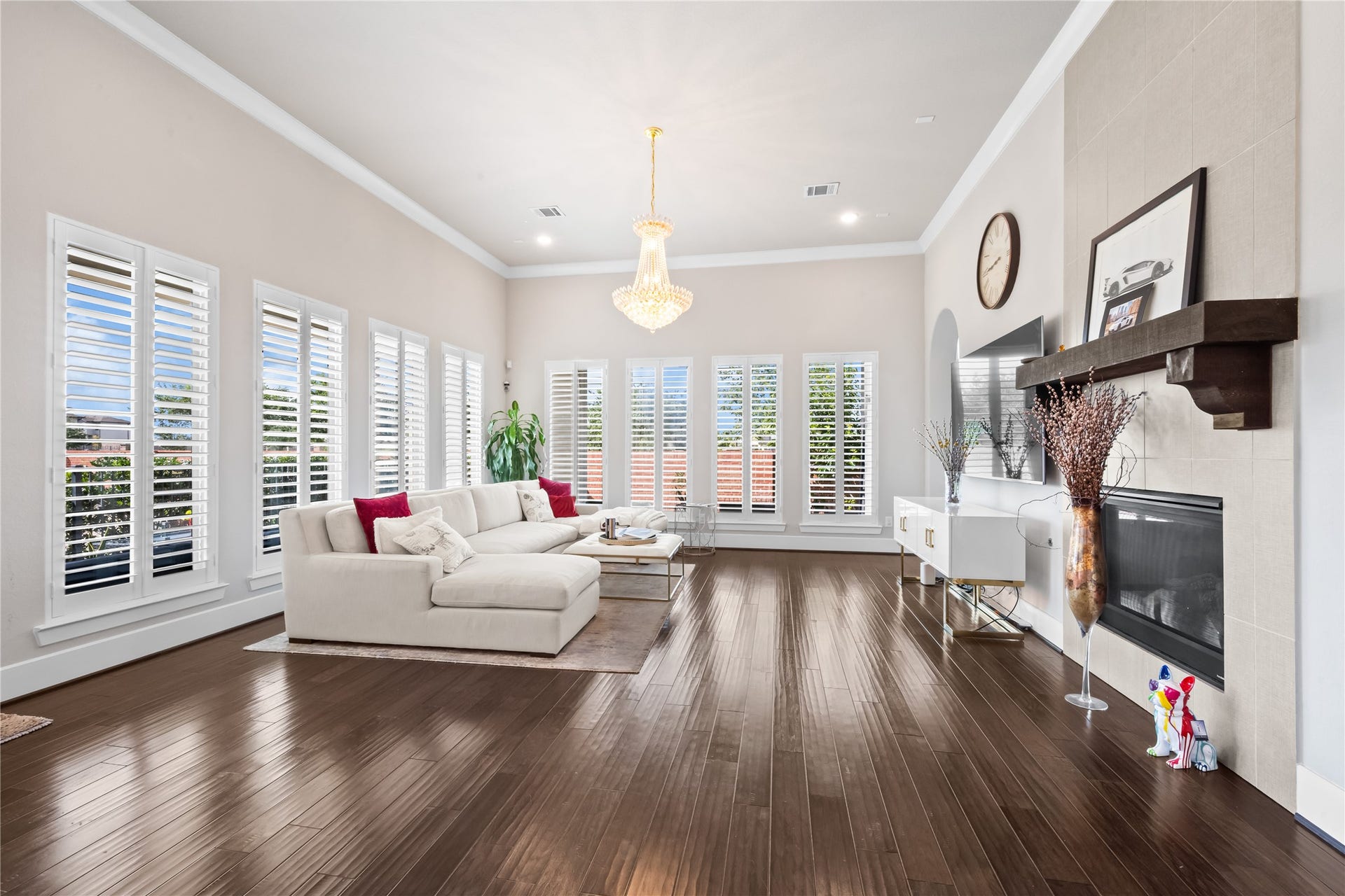 5014 Galahad Court, Missouri City, TX 77459 Living room w/ natural light and gas fireplace