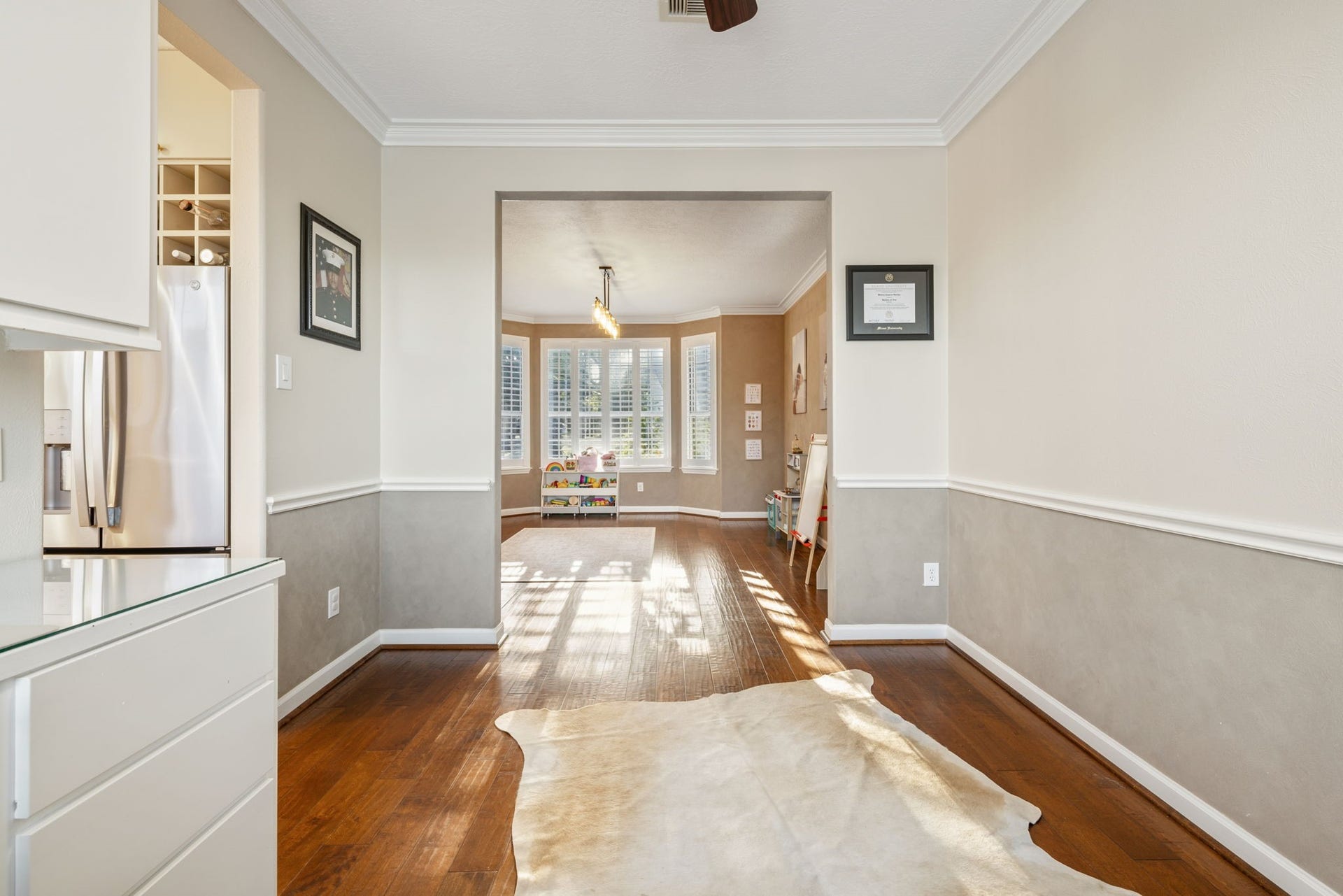 236 Sunset Ridge Drive, League City, TX 77573 An additional perspective highlights the office's generous proportions and seamless connection to the adjoining dining room.