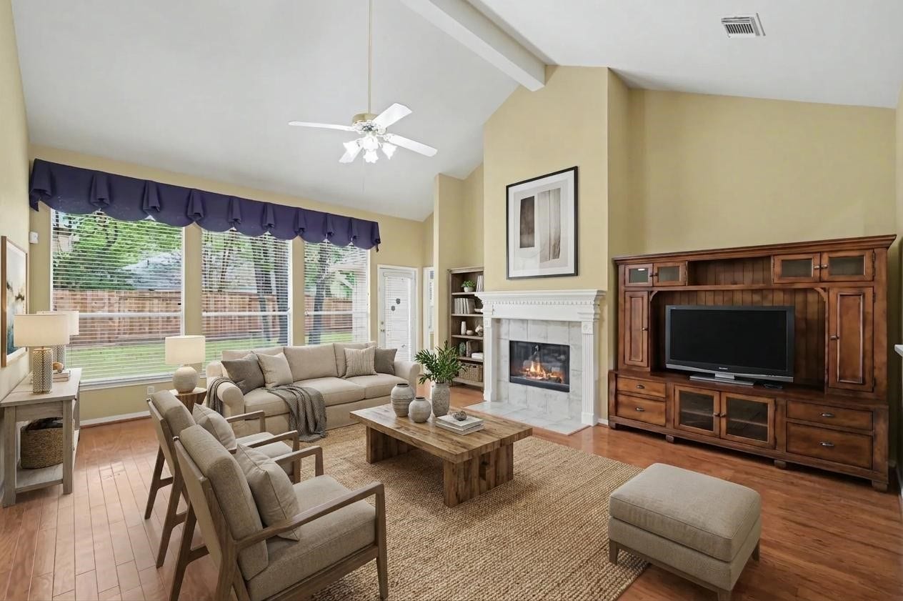 26 N Brooksedge Circle, The Woodlands, TX 77382 Virtually staged photo of the den/living room.