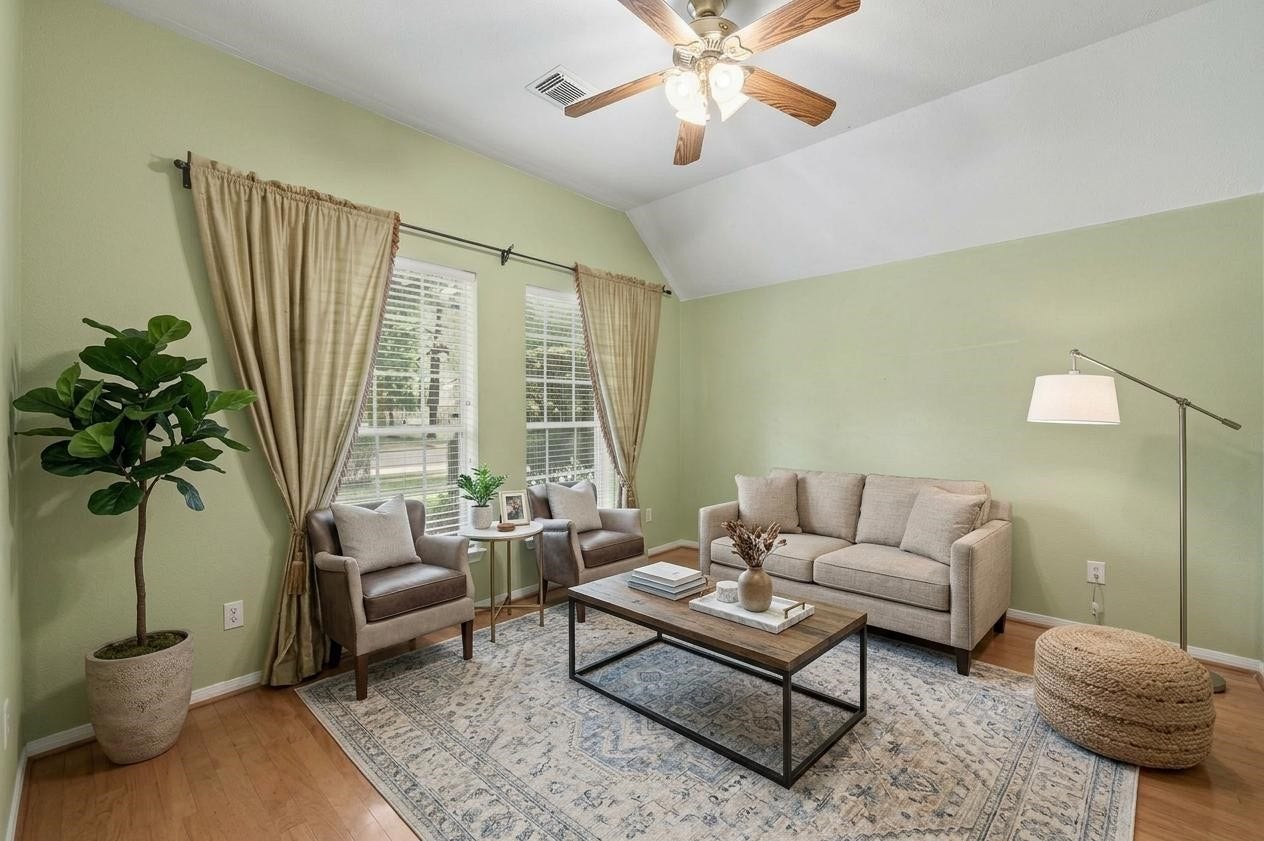 26 N Brooksedge Circle, The Woodlands, TX 77382 The versatile front room, virtually staged as a formal living room.