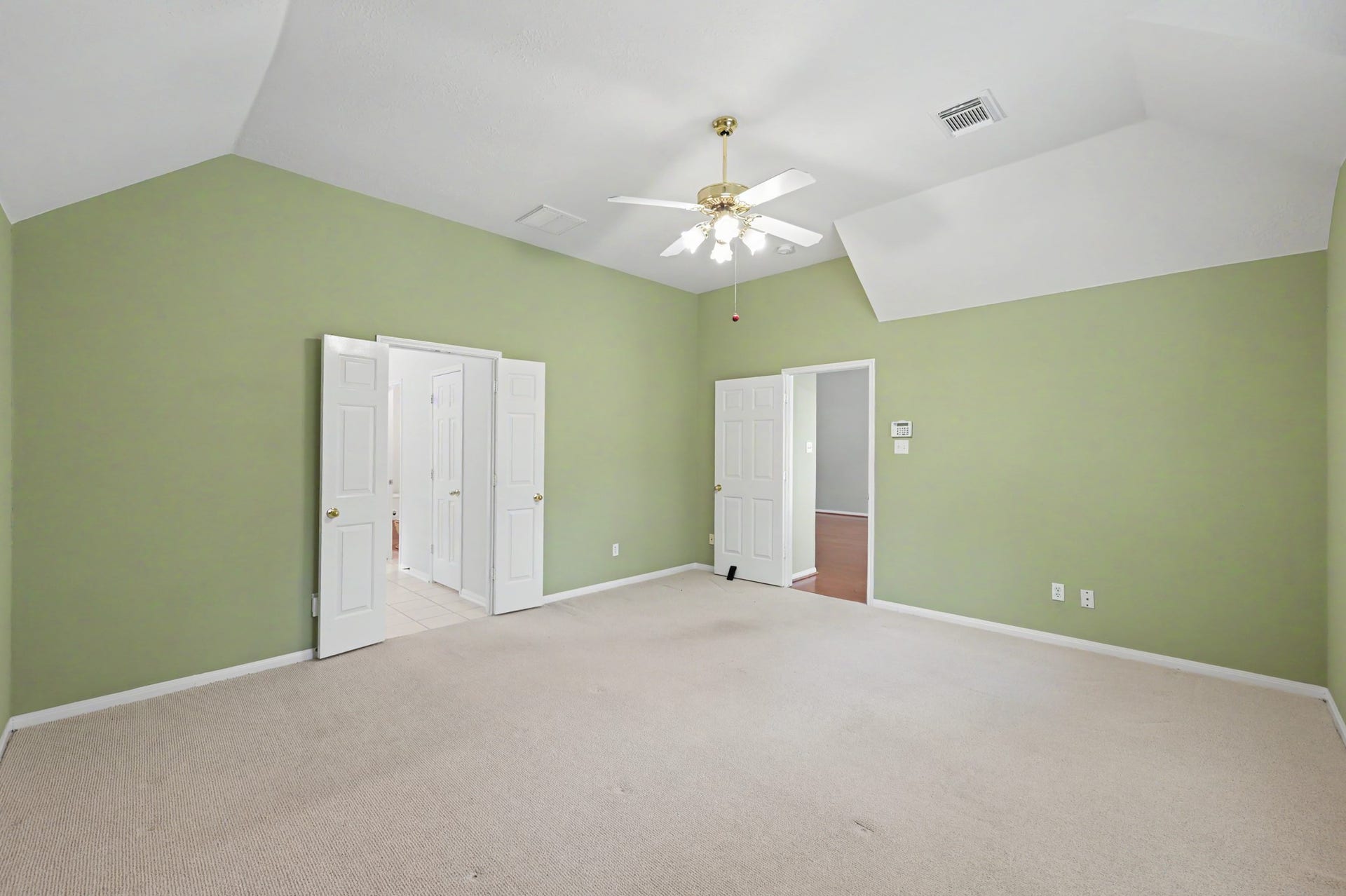 26 N Brooksedge Circle, The Woodlands, TX 77382 Alternate view of the primary bedroom and ensuite bathroom.