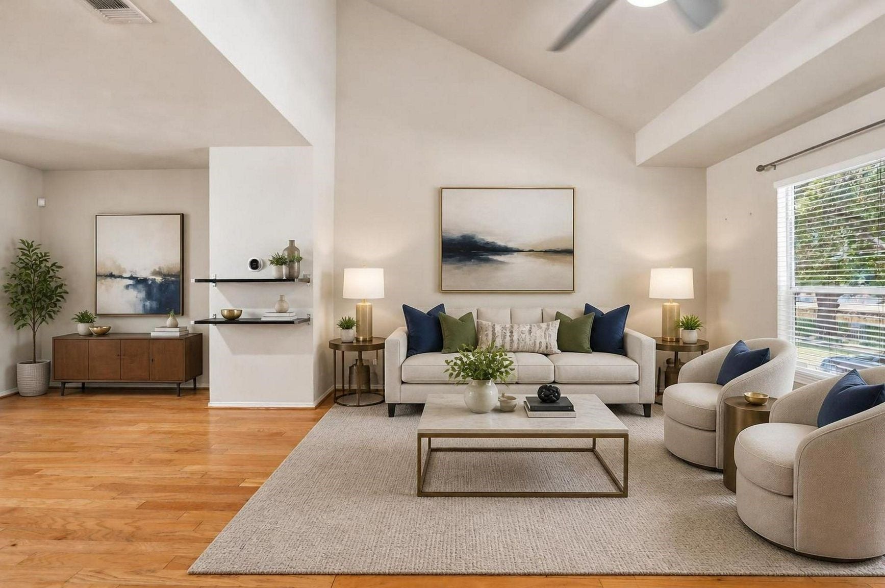 1828 Wheeler Street, Houston, TX 77004 The living area is located on the second floor with a balcony overlooking the private school across the street. REAL wood floors throughout this living space elevate the space! *This photo is virtually staged*