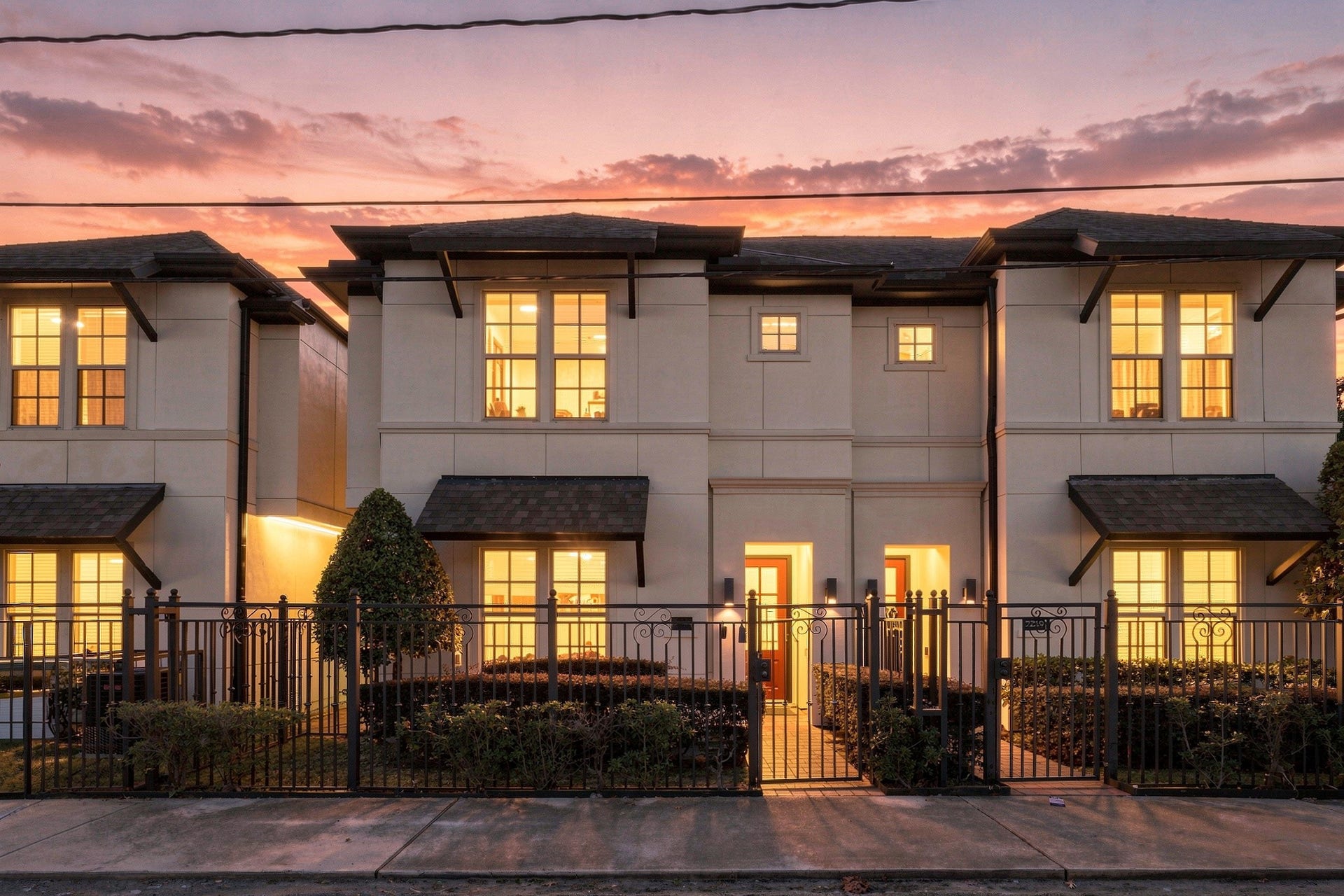 2217 Bastrop Street, Houston, TX 77003 Sunset view of front of townhome.