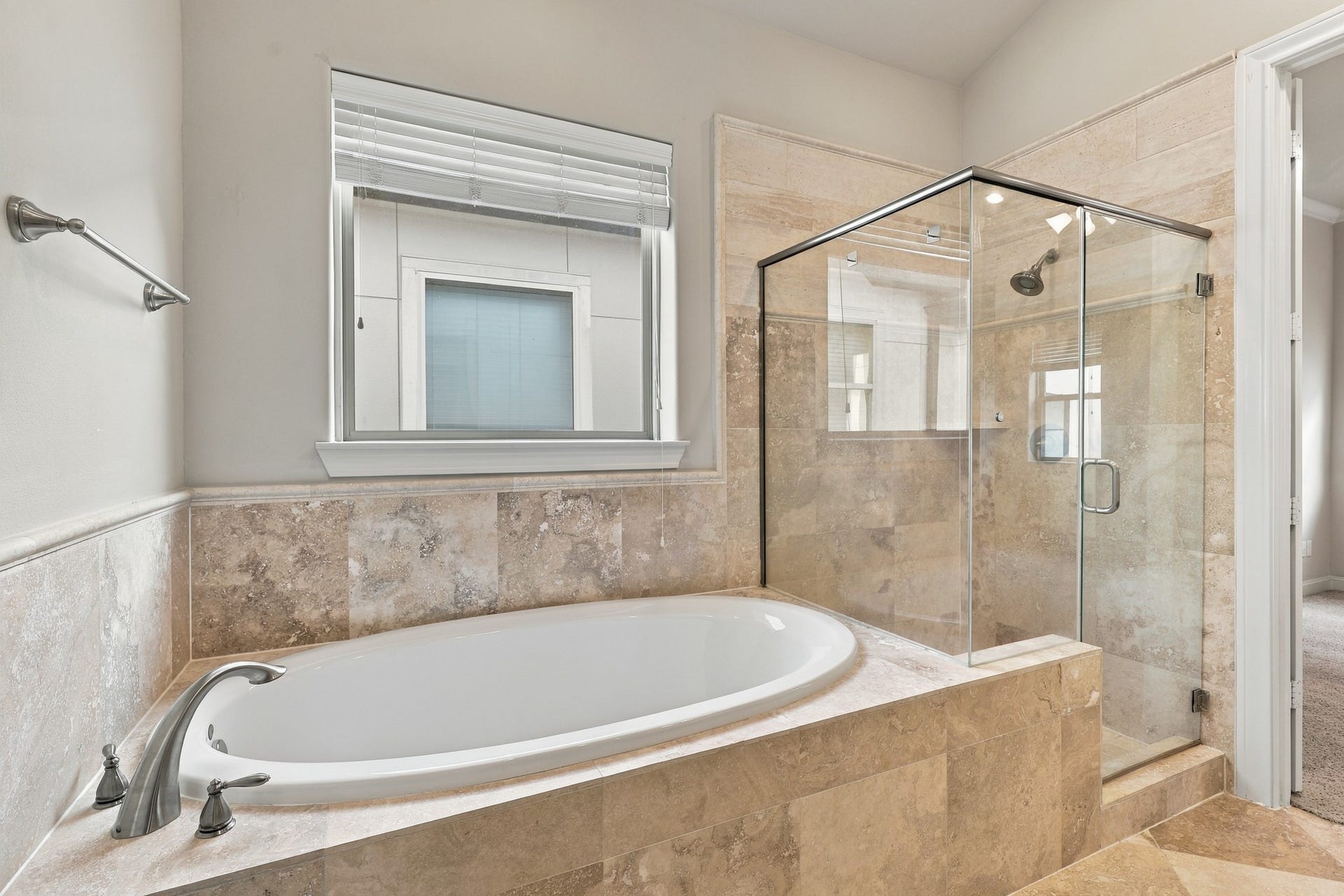 2217 Bastrop Street, Houston, TX 77003 Shower and tub combo in primary bathroom.