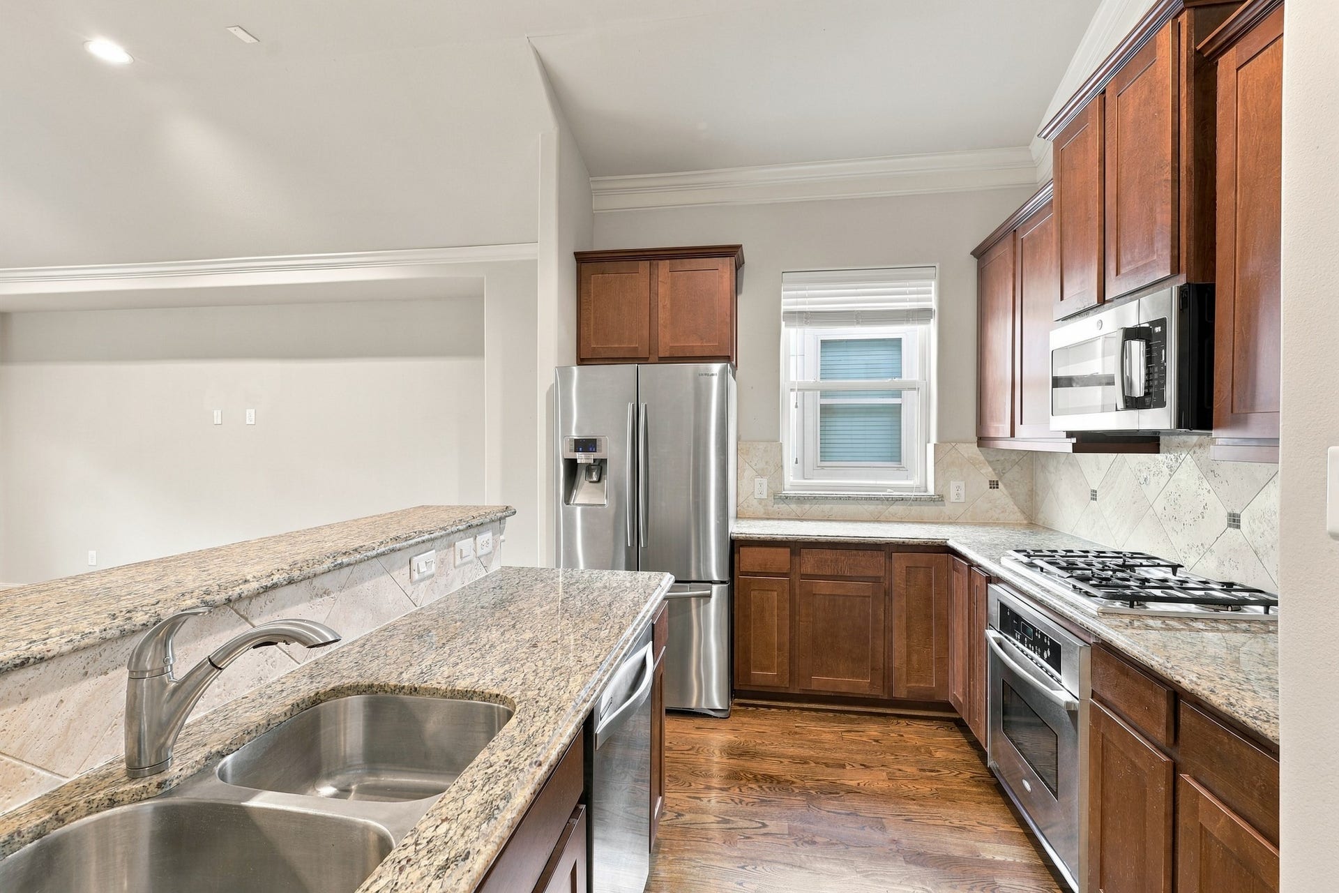 2217 Bastrop Street, Houston, TX 77003 Kitchen island with a breakfast bar.