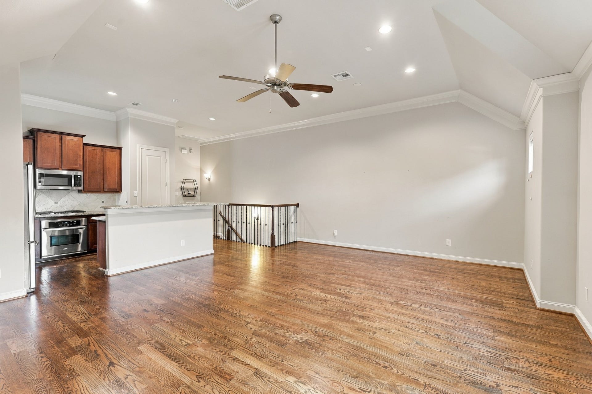 2217 Bastrop Street, Houston, TX 77003 Recessed lights and ceiling fan in second floor living area.