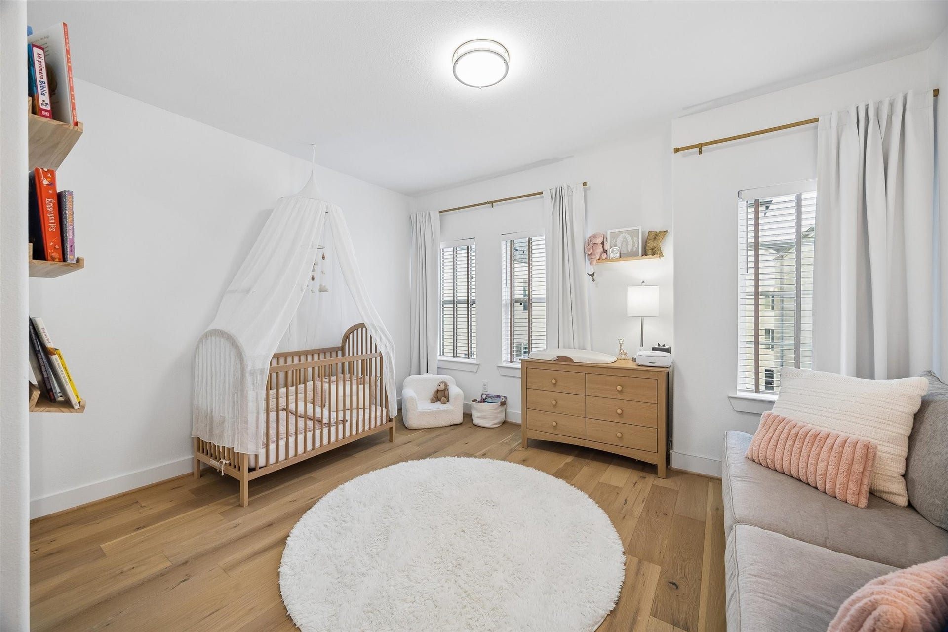 956 Dunleigh Meadows Lane, Houston, TX 77055 The secondary bedroom is thoughtfully designed with ample space, natural light, and its own ensuite bath.