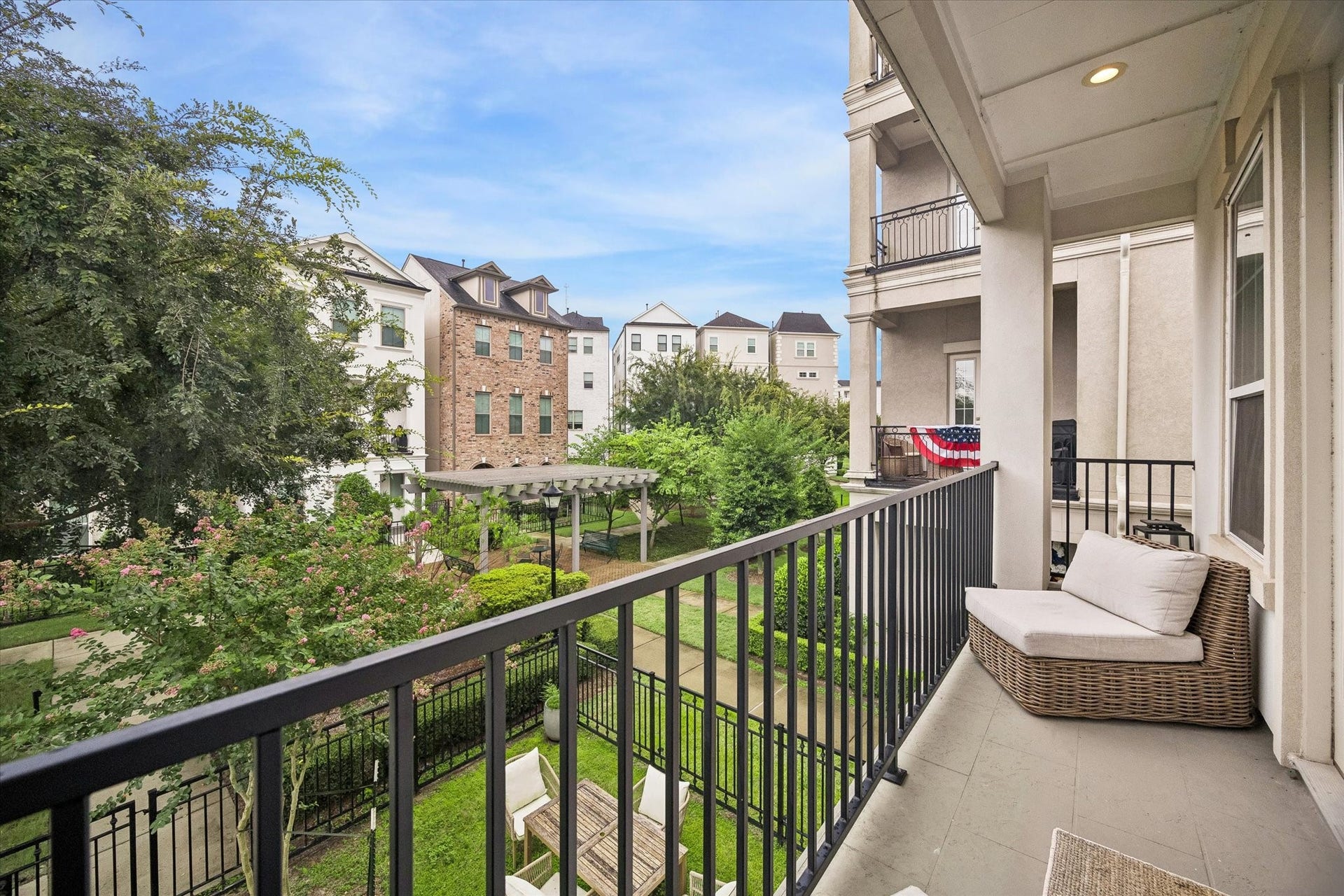 956 Dunleigh Meadows Lane, Houston, TX 77055 Step outside to the private balcony and enjoy morning coffee or evening relaxation overlooking the community's beautifully maintained surroundings.
