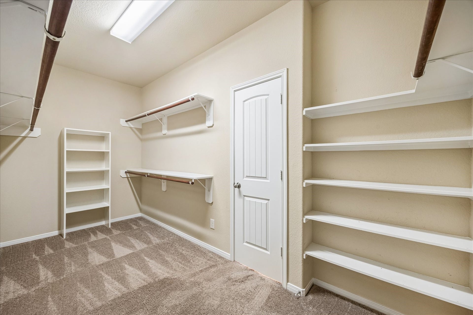 30 Glade Park Drive, Missouri City, TX 77459 Shop until you drop, this massive walk-in closet can handle it. With built-in shelves for shoes and accessories, plenty of hanging space for your wardrobe, and room to keep everything organized, there's a place for all your favorites and maybe a few new finds.