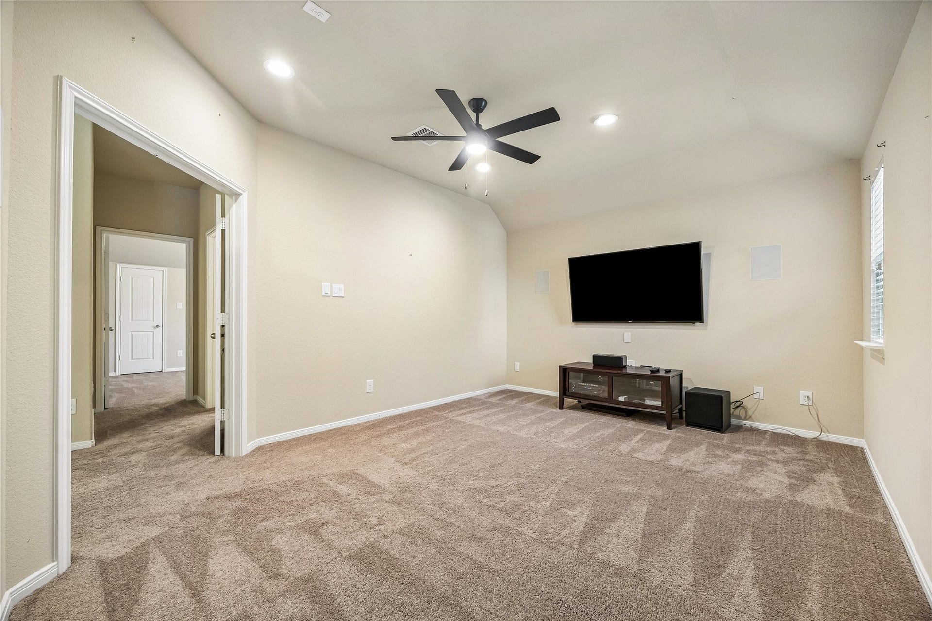 30 Glade Park Drive, Missouri City, TX 77459 Movie nights, gaming marathons, or your own private entertainment retreat, this versatile media room is ready for whatever you have in mind. Close the wood French doors, get comfortable, and enjoy a space designed for fun on your own terms.