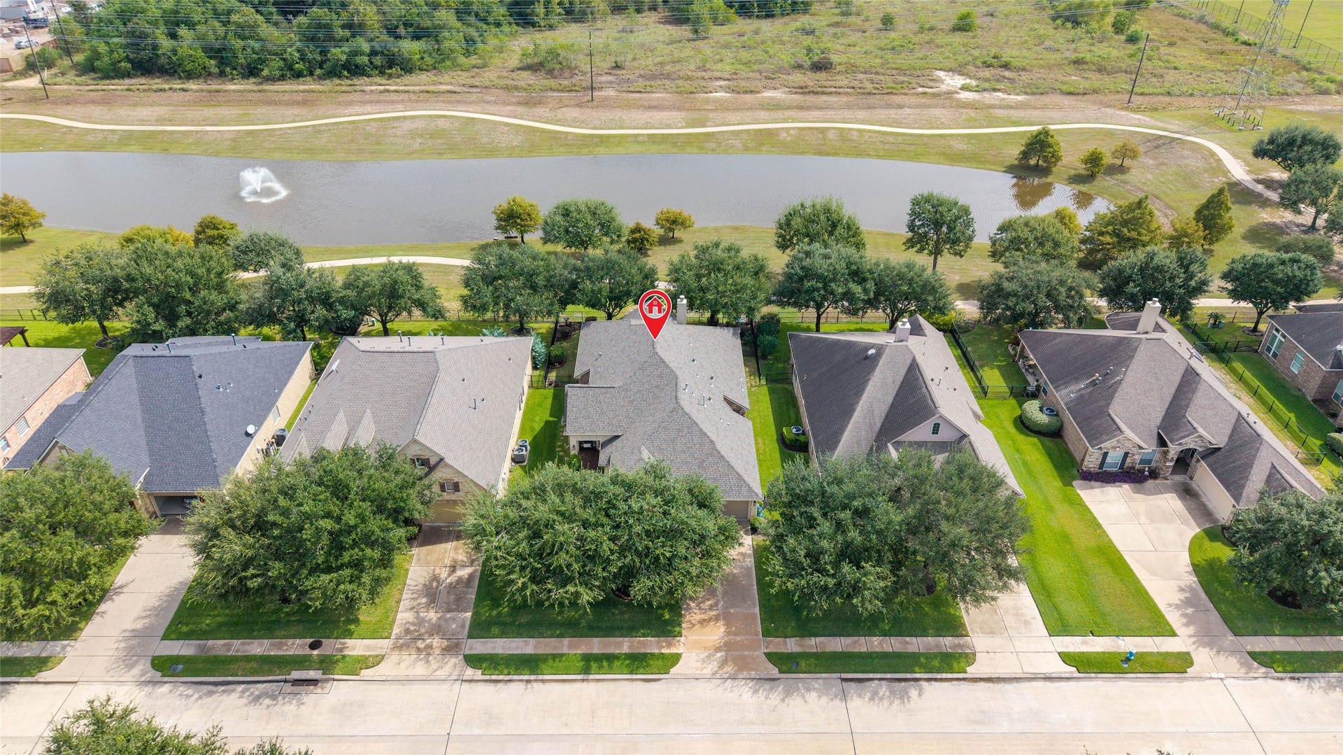 9234 E Canyon Lake Springs Drive, Cypress, TX 77433 Stunning water view from the back of the home. Walking trail around the lake.
