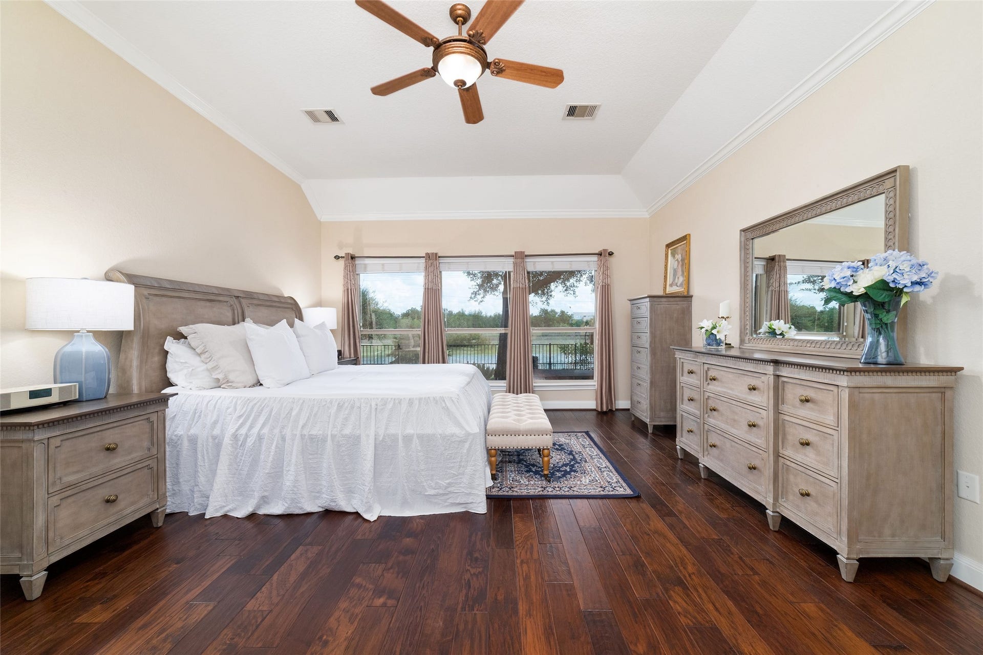 9234 E Canyon Lake Springs Drive, Cypress, TX 77433 Wake up to this beautiful view every morning!! This primary bedroom is large and can accommodate your bedroom suite.