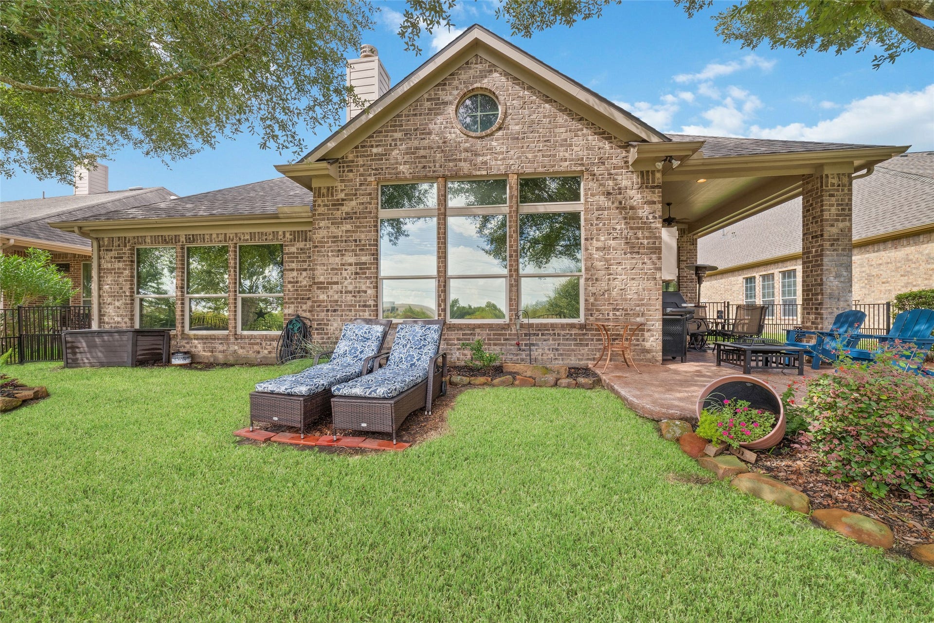 9234 E Canyon Lake Springs Drive, Cypress, TX 77433 Backyard has plenty of yard space to do with what you wish. Whether gardening or relaxing taking in the lake view.