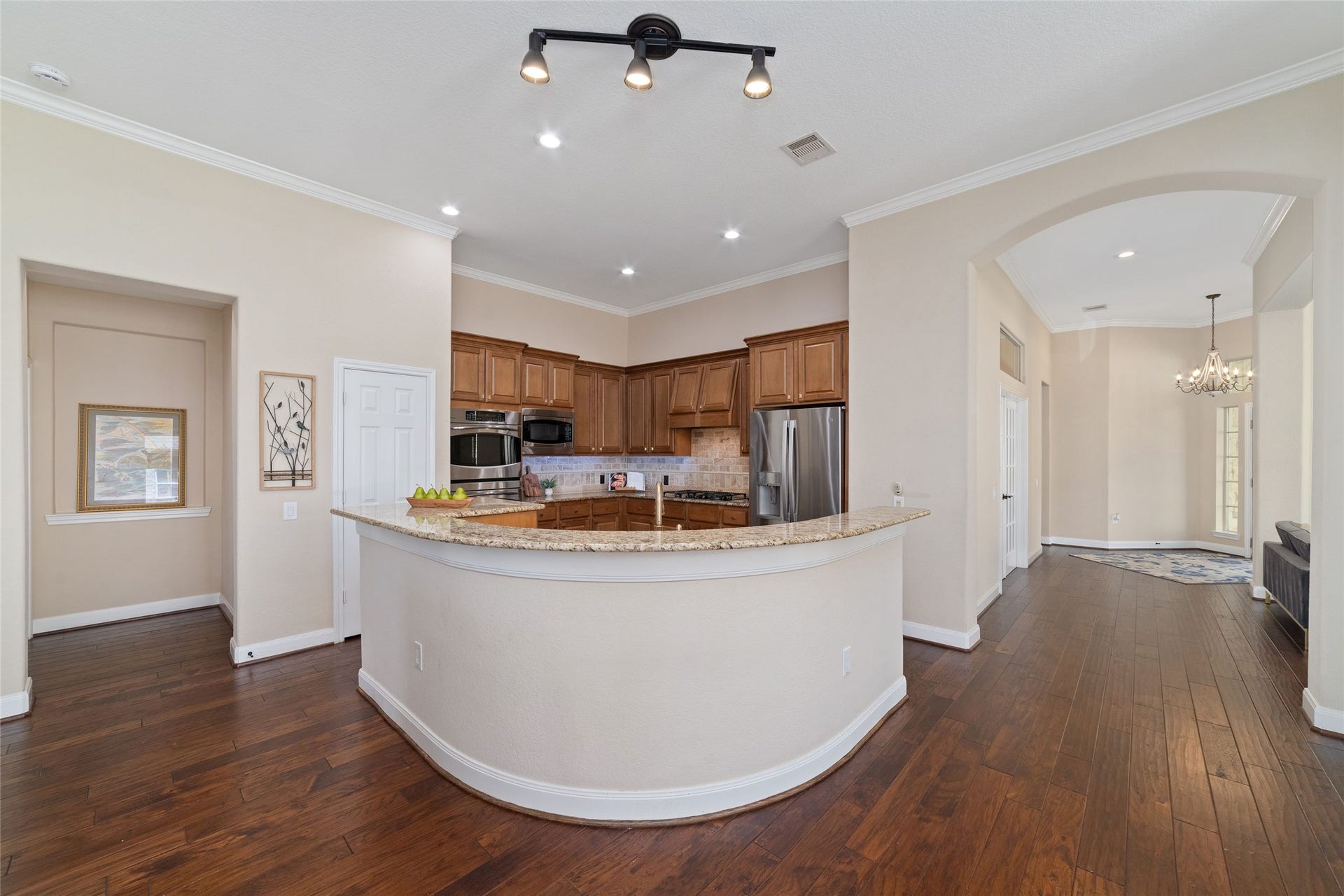 9234 E Canyon Lake Springs Drive, Cypress, TX 77433 Gorgeous wood floors flow through the main living areas of this home that add so much warmth. This kitchen will draw you in!