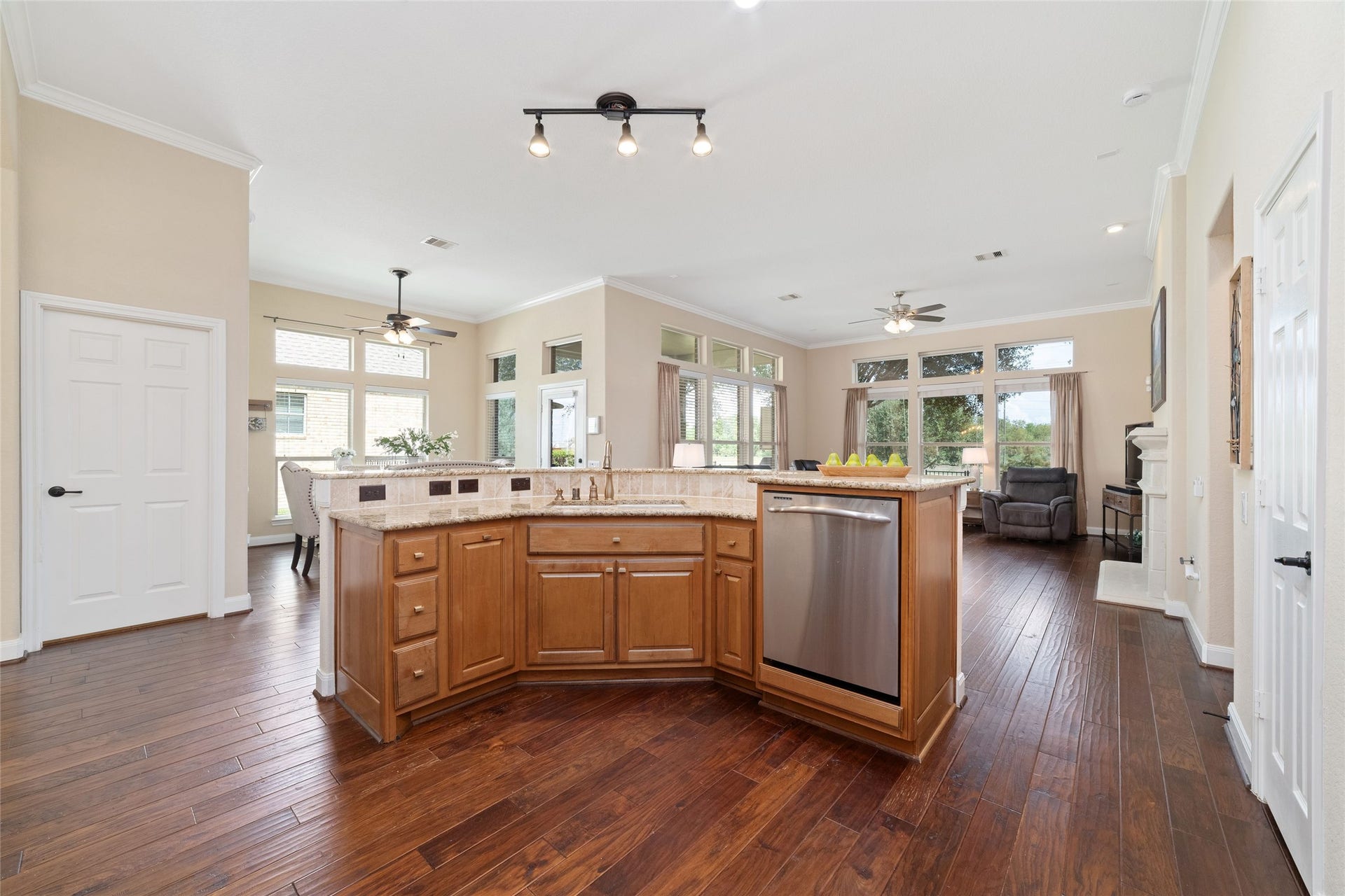 9234 E Canyon Lake Springs Drive, Cypress, TX 77433 Take in the views of the water from the kitchen. The gorgeous outdoors surrounds you.
