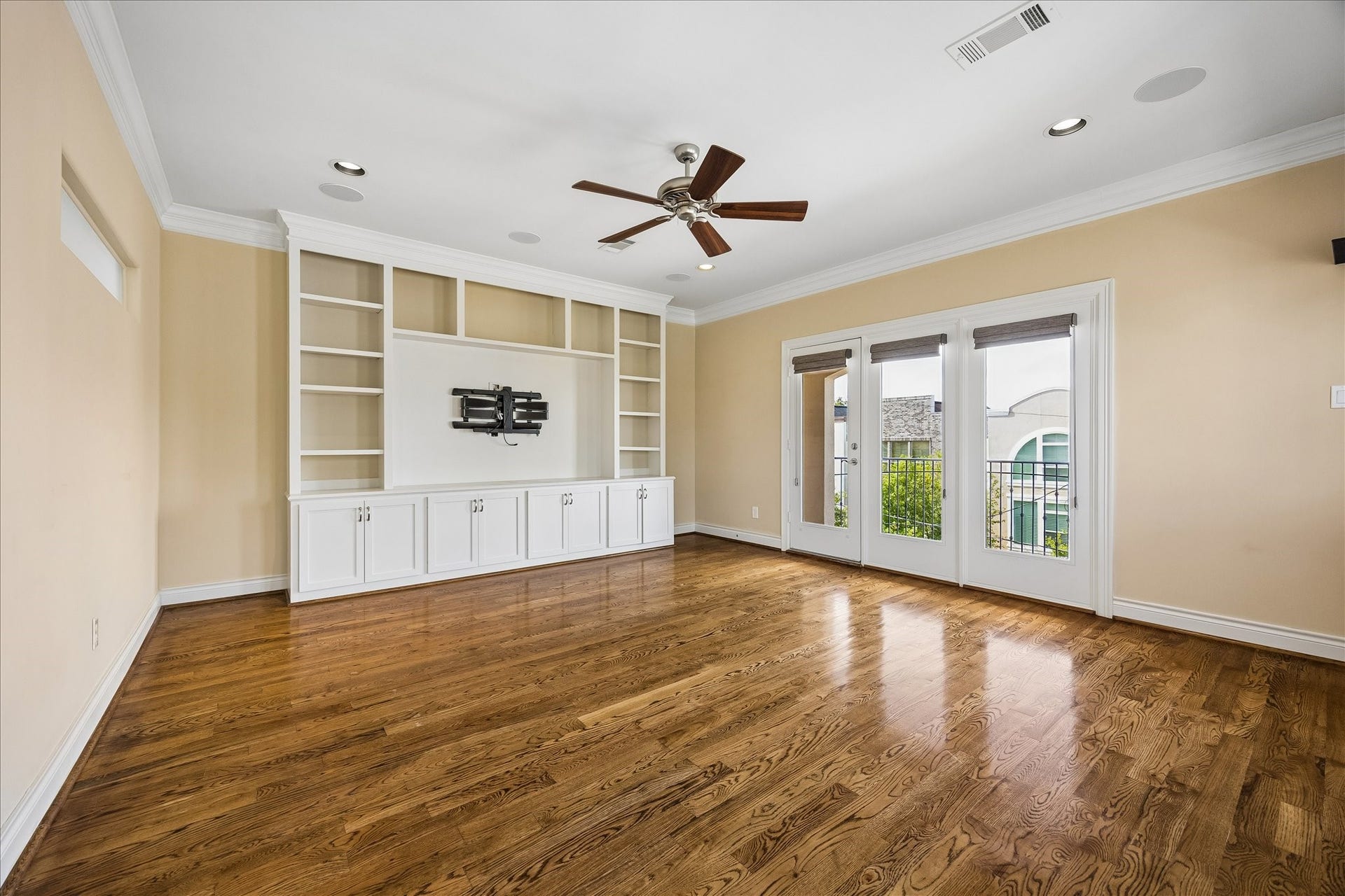3rd floor game room with balcony and natural light