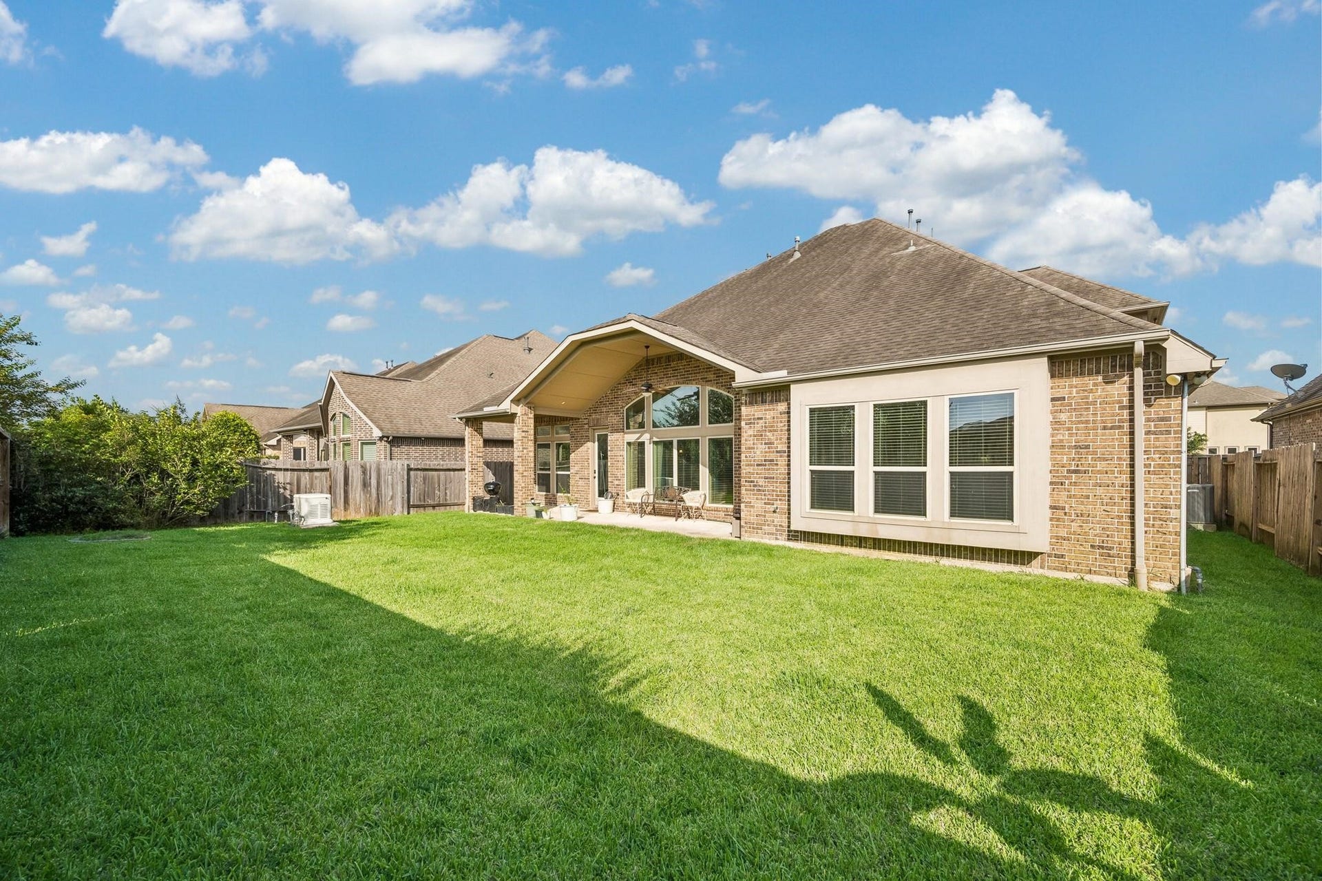 6031 Granite Shadow Lane, Porter, TX 77365 Large area for activities inside fenced backyard.