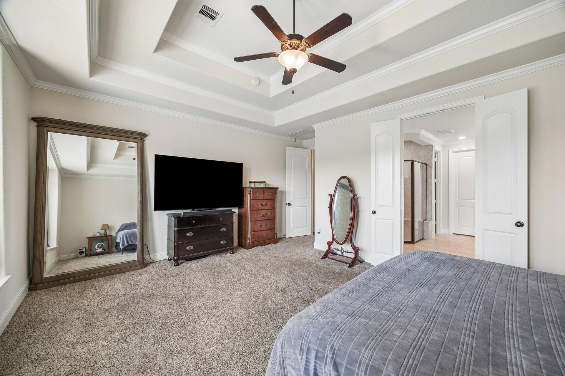6031 Granite Shadow Lane, Porter, TX 77365 Coffered-style tray ceiling with crown molding.