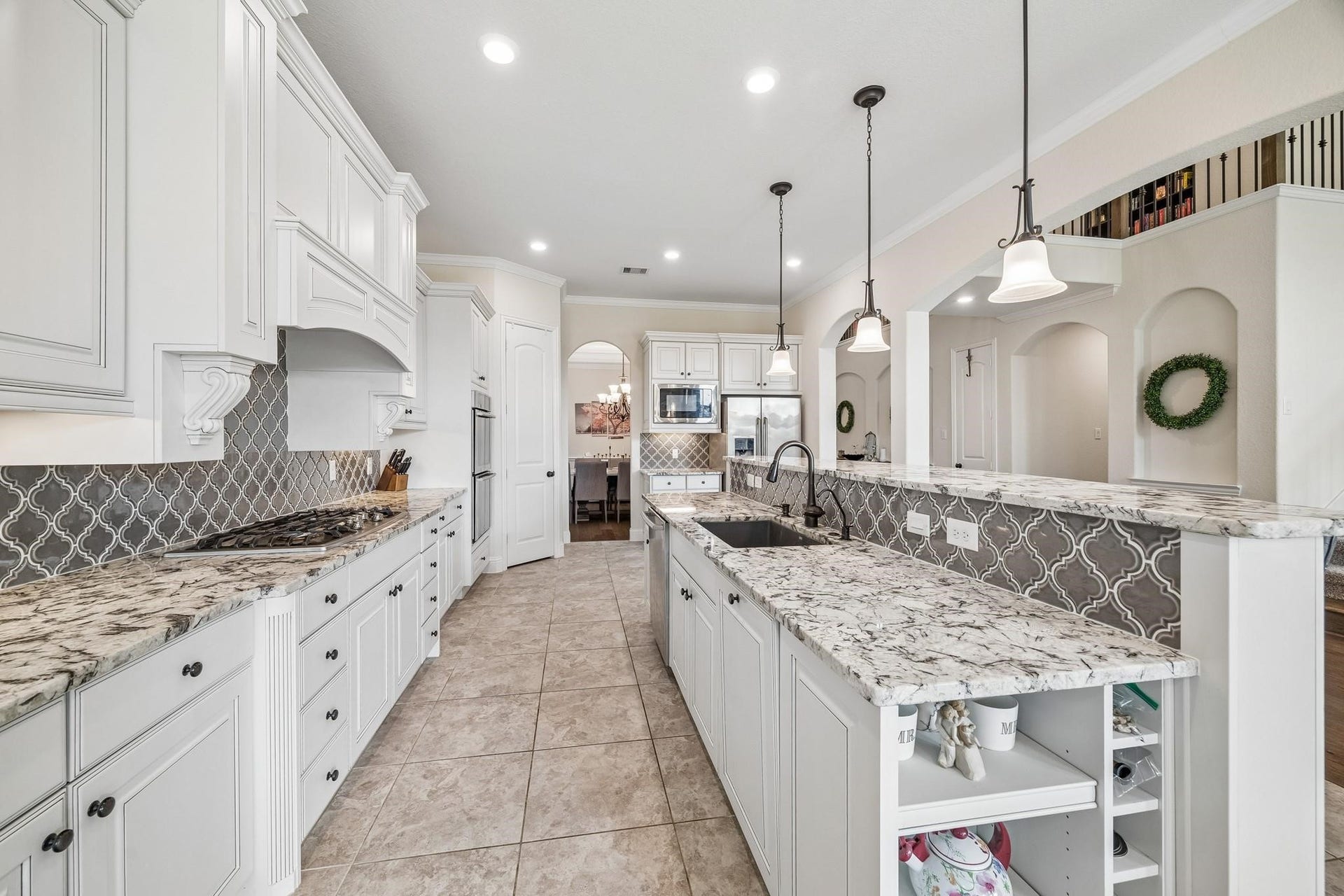 6031 Granite Shadow Lane, Porter, TX 77365 Oversized island with large undermount sink.