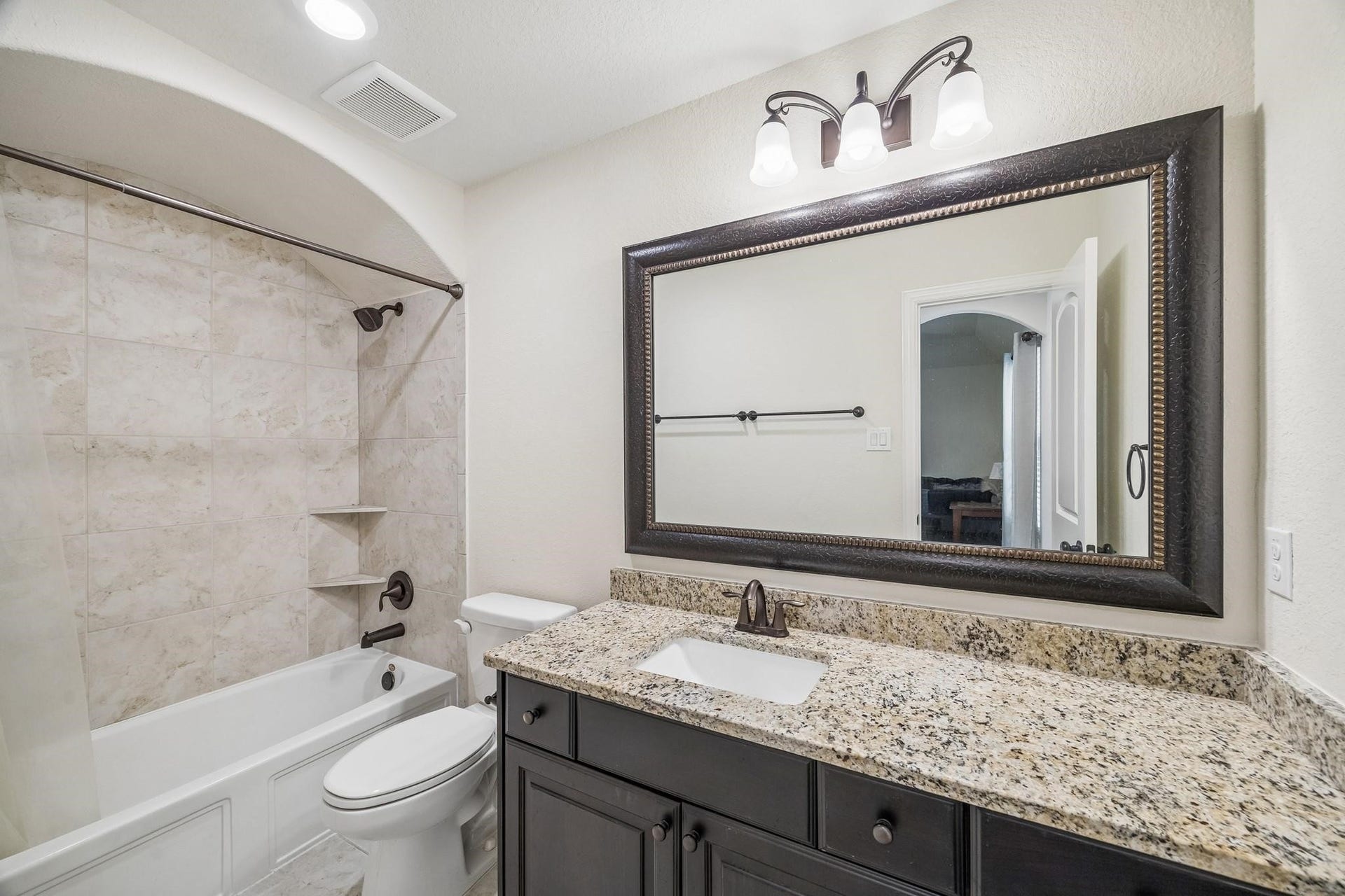 6031 Granite Shadow Lane, Porter, TX 77365 Beautiful granite countertops matching all bathrooms.