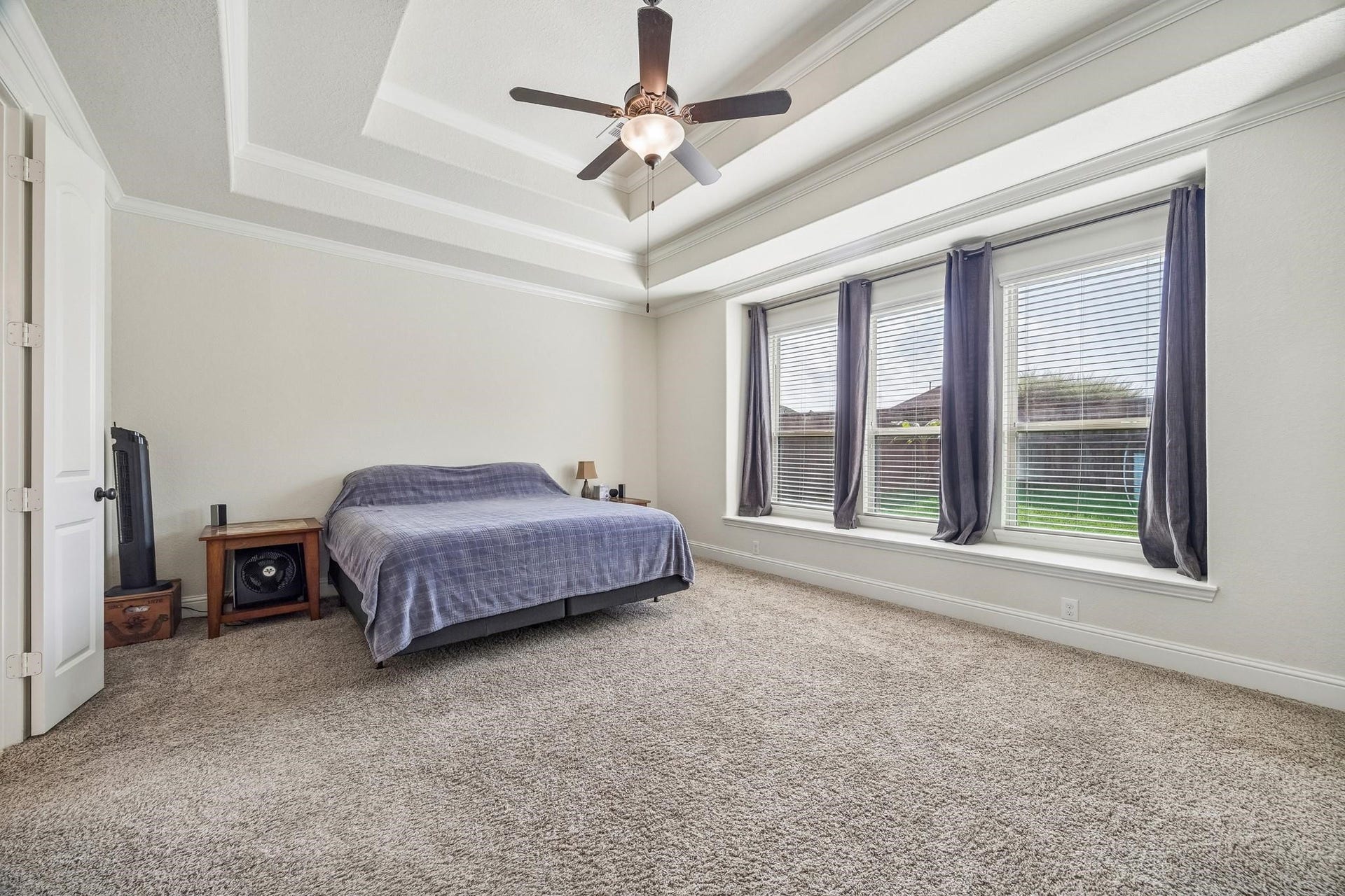 6031 Granite Shadow Lane, Porter, TX 77365 Primary bedroom with en suite to primary bathroom.