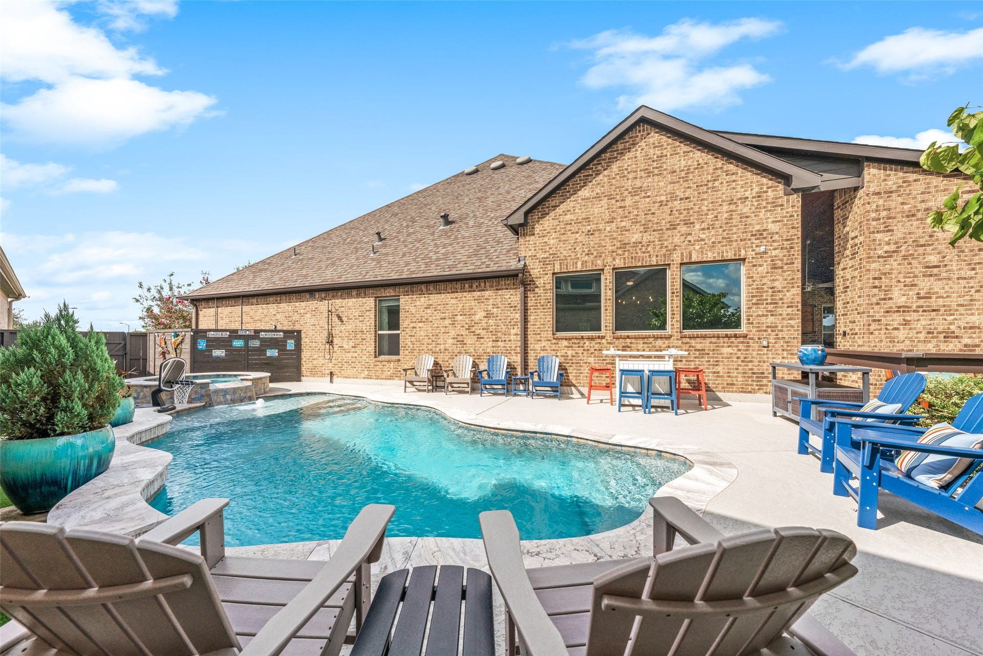 23926 Arcola Glen Lane, Katy, TX 77493 This inviting backyard oasis features a refreshing pool and spa, perfect for relaxation and outdoor enjoyment.