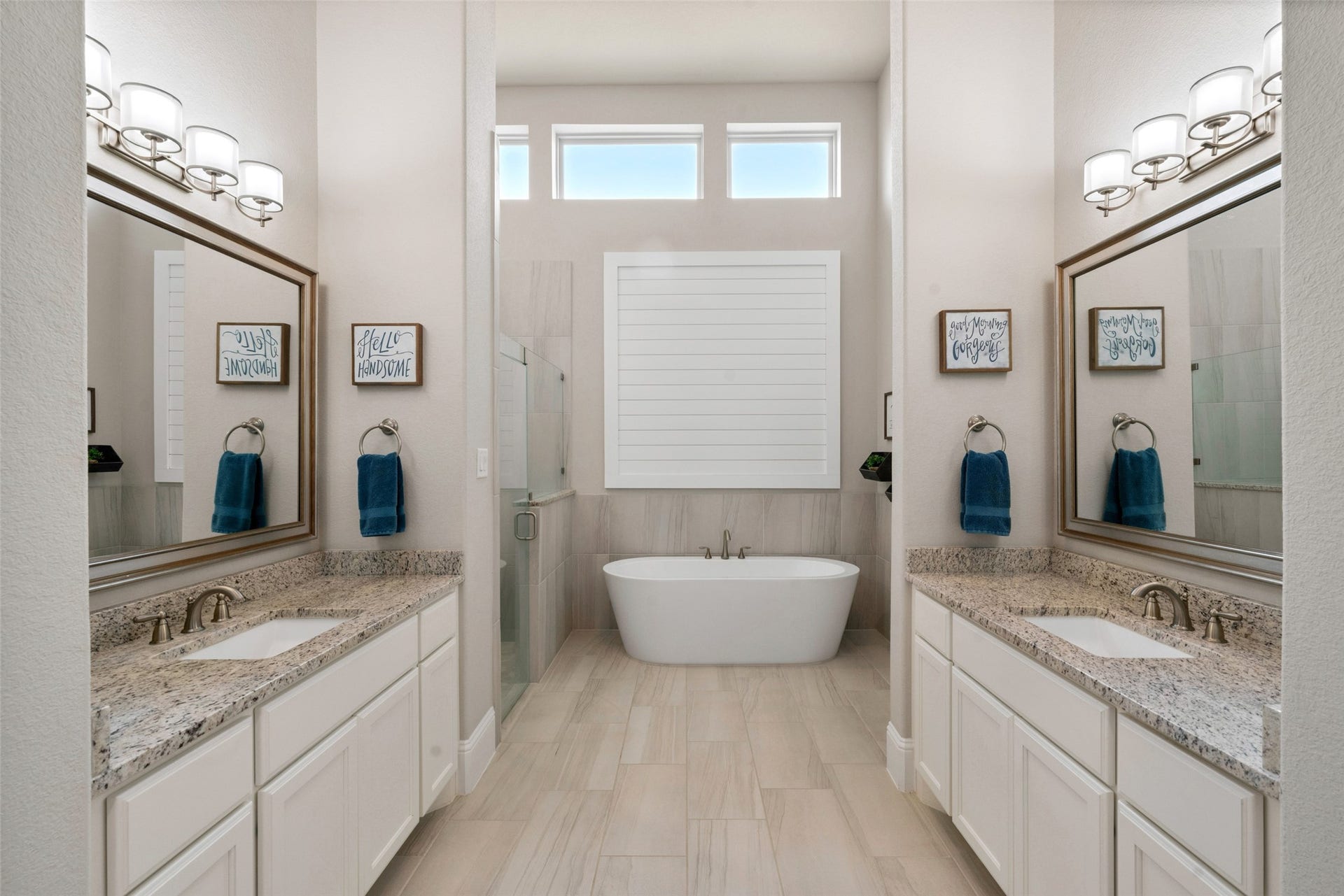 23926 Arcola Glen Lane, Katy, TX 77493 The primary ensuite features modern finishes, including granite countertops and beautiful linear tile flooring. Its highly desirable layout offers separate vanities, providing an abundance of both counter and cabinet space.