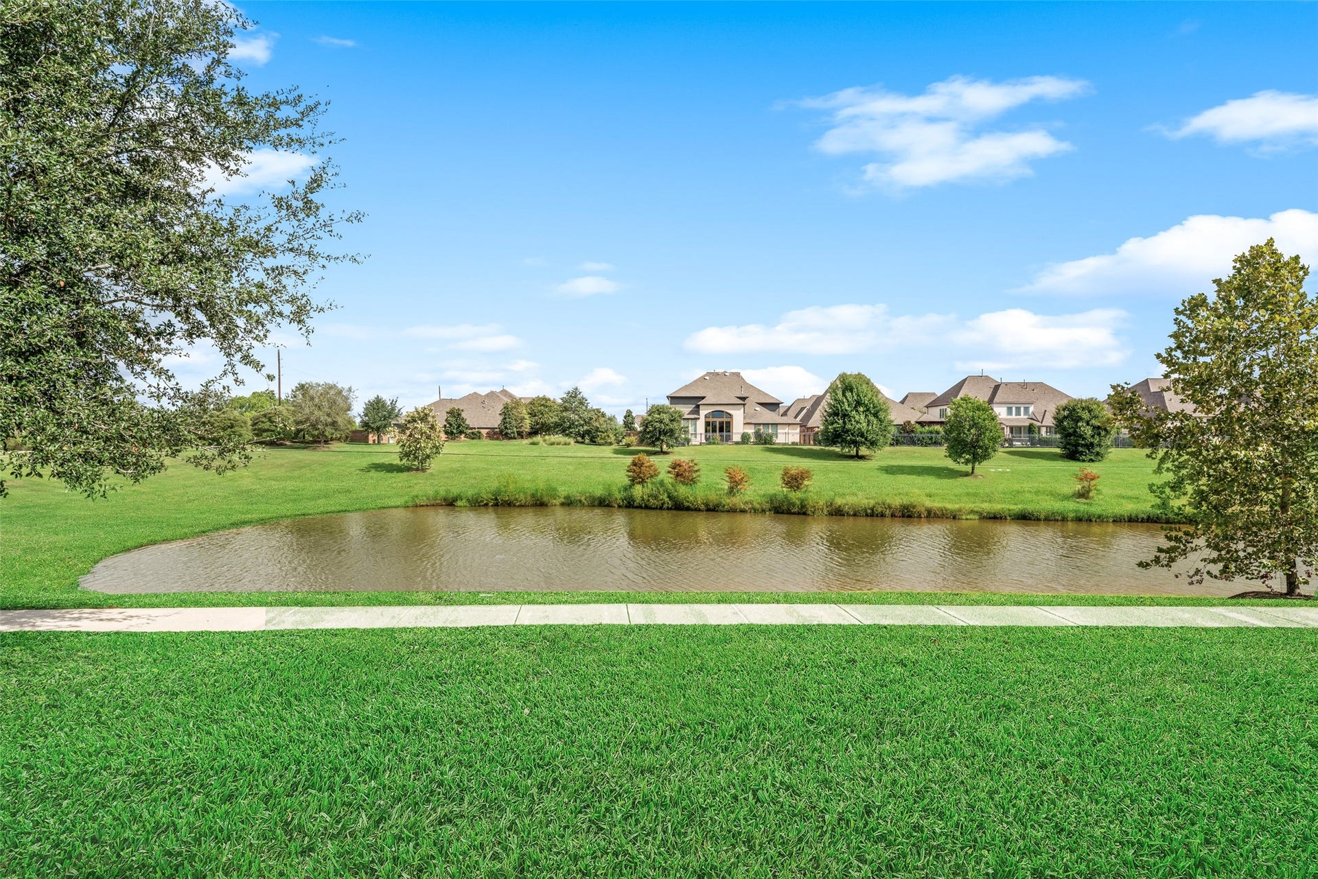 23926 Arcola Glen Lane, Katy, TX 77493 Spectacular views from the wrought iron fence in the spacious backyard!
