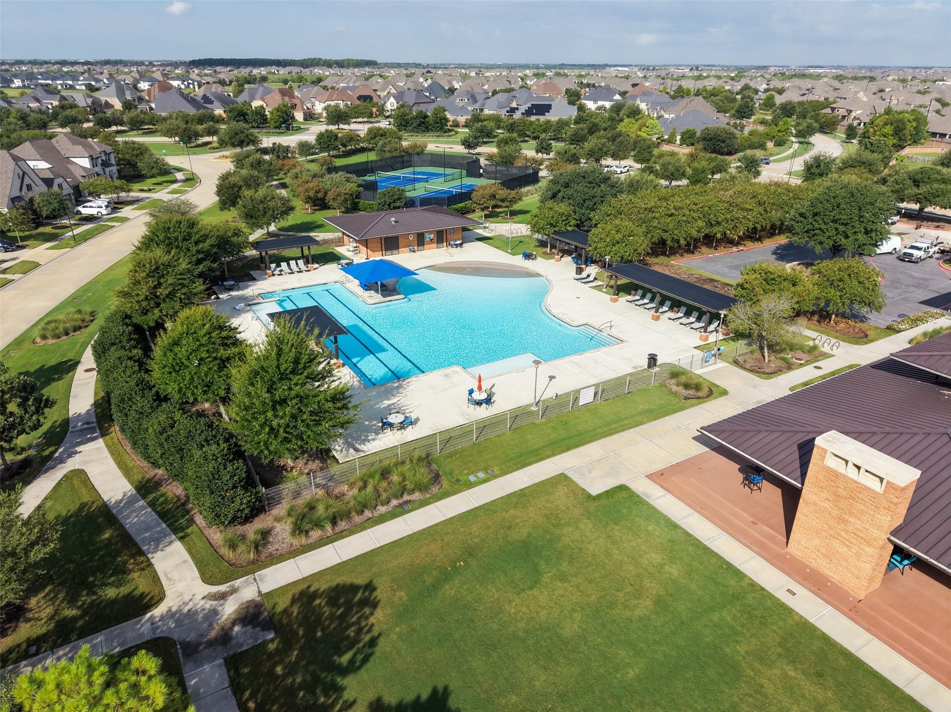 23926 Arcola Glen Lane, Katy, TX 77493 Spacious community pool has swim lanes and shallow area for small children.