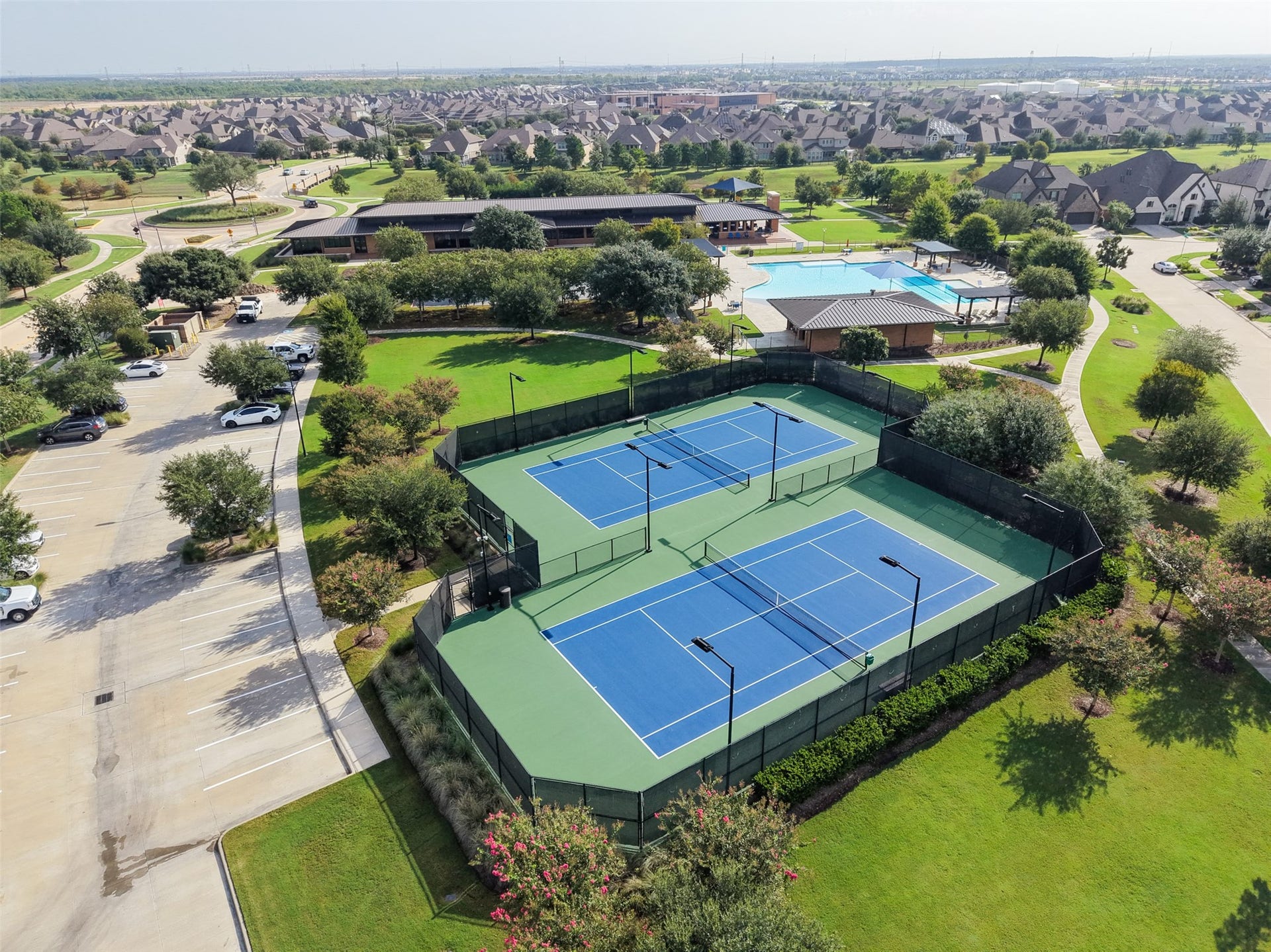 23926 Arcola Glen Lane, Katy, TX 77493 Elyson is a gated master planned community with pools and ball courts.