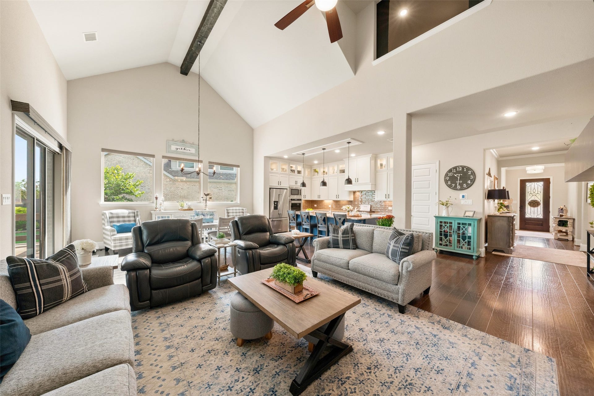 23926 Arcola Glen Lane, Katy, TX 77493 This family room features high cathedral ceilings that create an inviting sense of openness and volume.