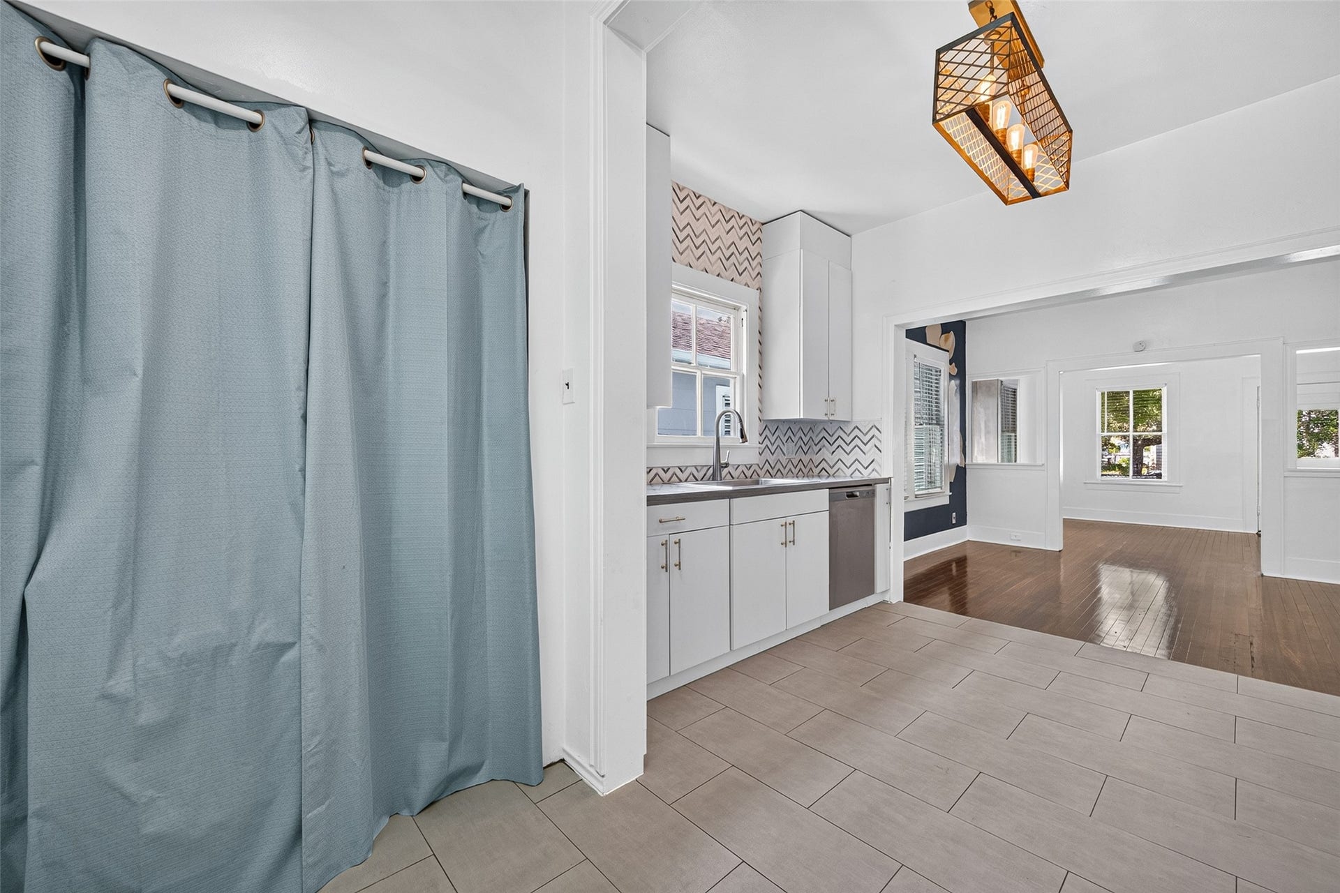 4807 Avenue P 1/2, Galveston, TX 77551 UTILITY- ALL IN ONE WASHER DRYER BEHIND CURTAIN