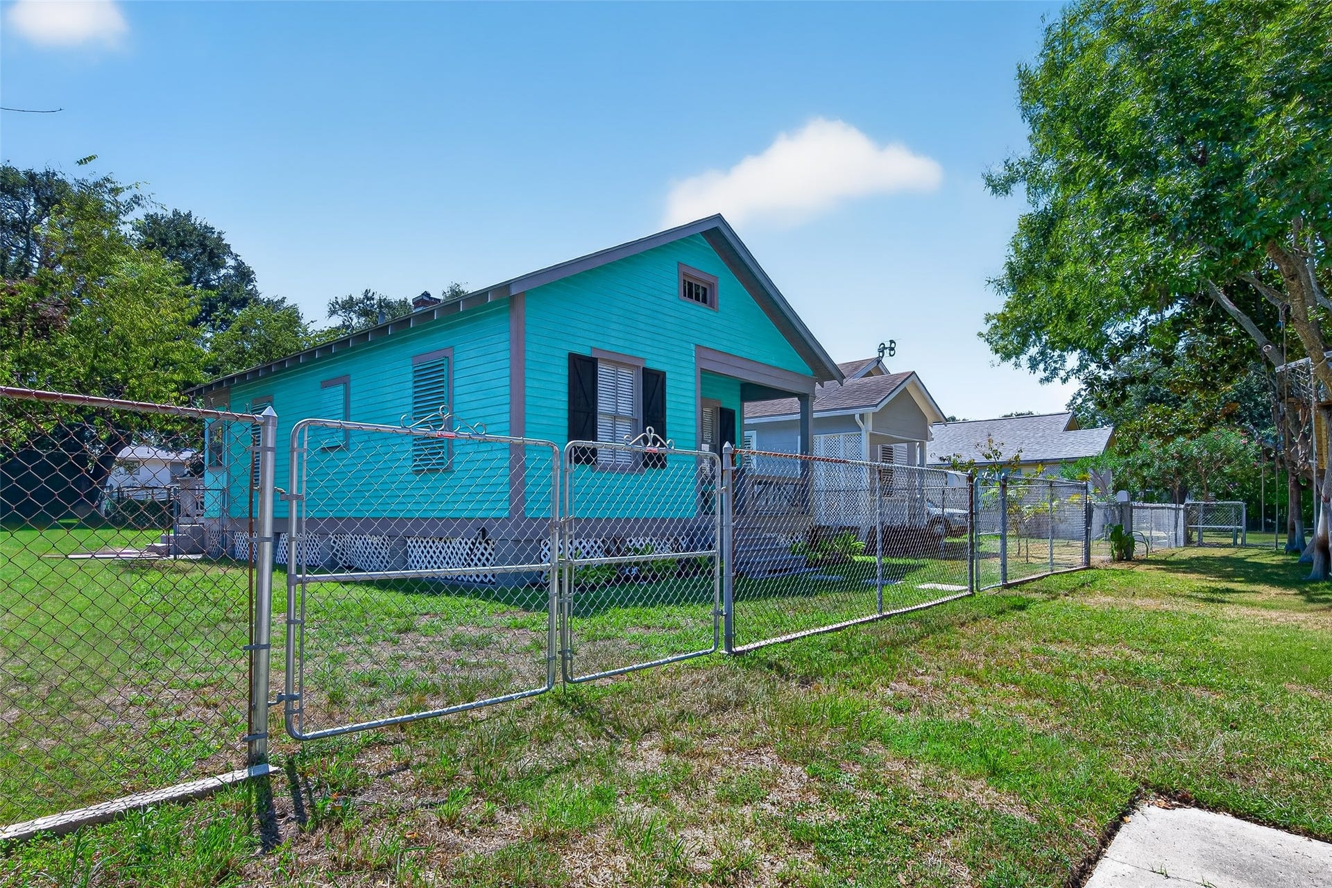 4807 Avenue P 1/2, Galveston, TX 77551 off street parking behind gate