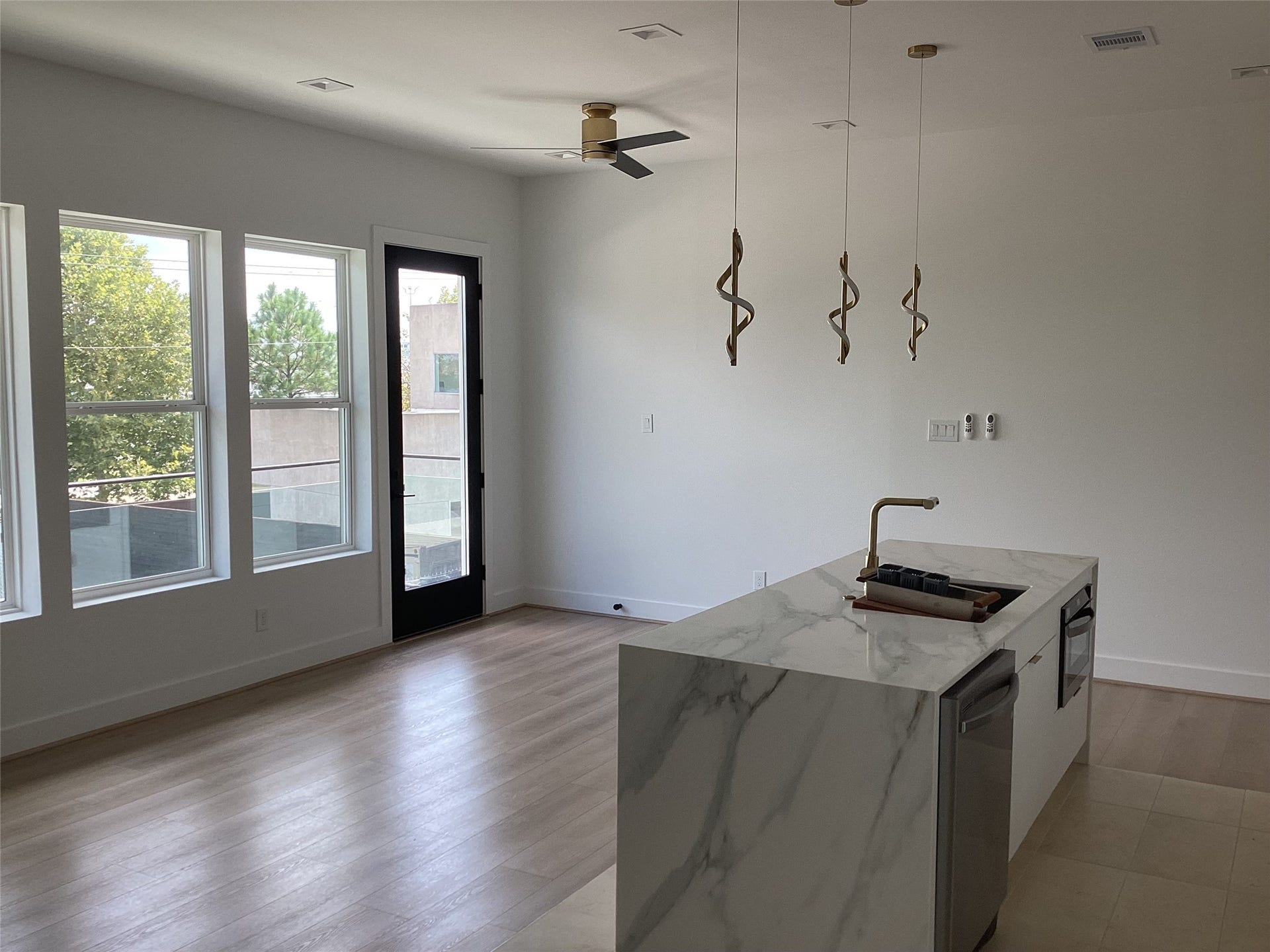 3116 Clay Street, Houston, TX 77003 kitchen with view to the balcony