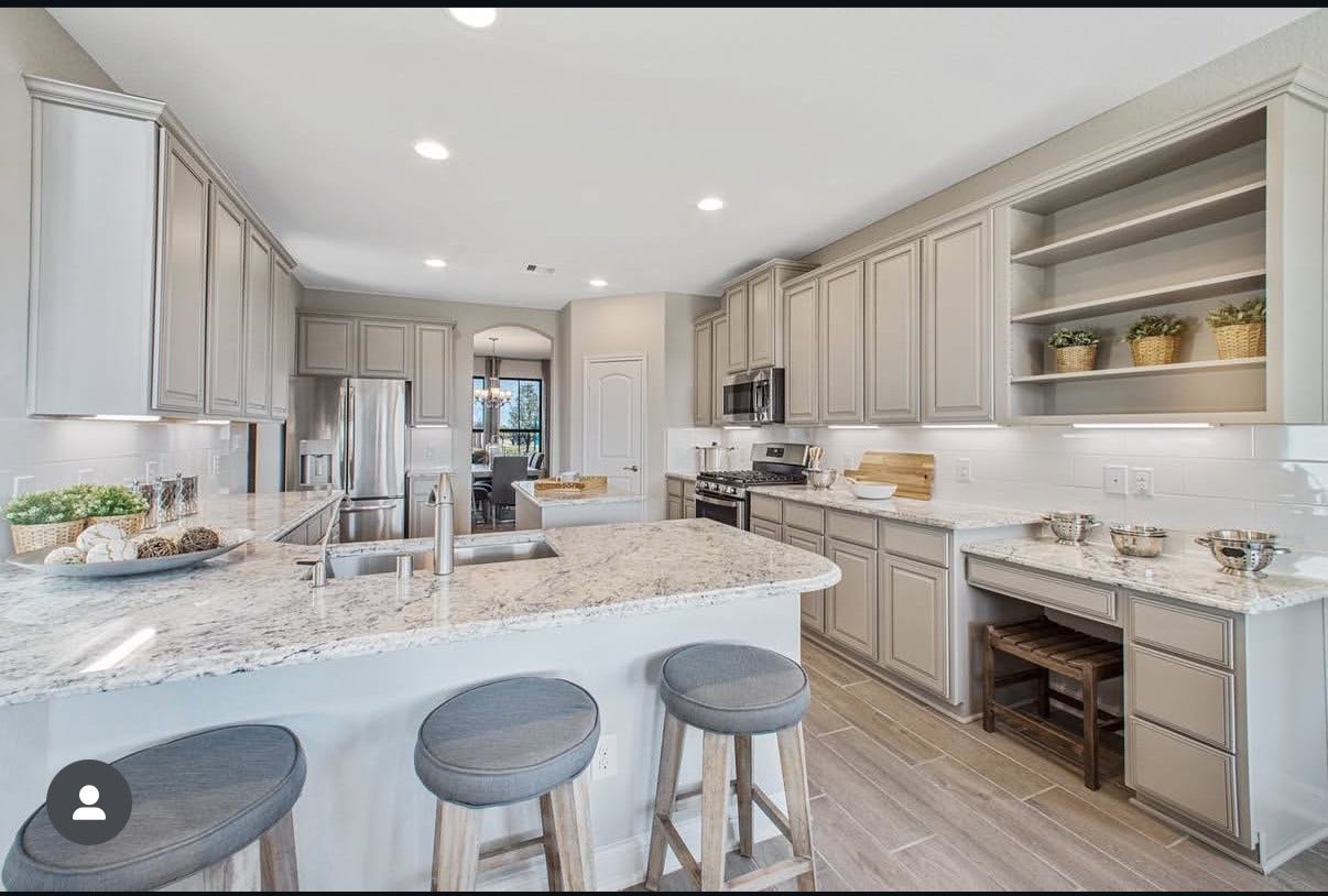 13201 Anchor Bay Drive, La Marque, TX 77568 Spacious kitchen featuring granite countertops, stainless steel appliances, and ample cabinetry, perfect for culinary enthusiasts.
