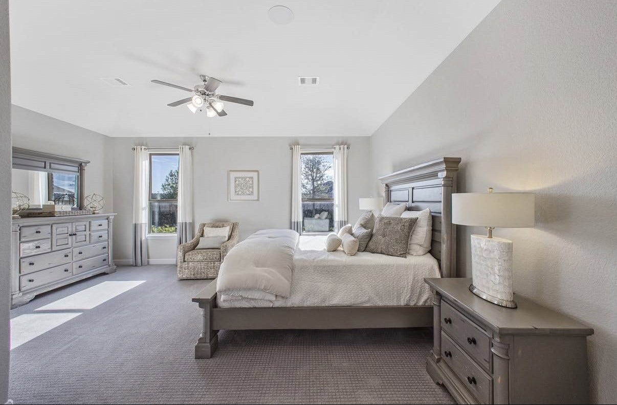 13201 Anchor Bay Drive, La Marque, TX 77568 Spacious and bright bedroom with large windows that fill the room with natural light.