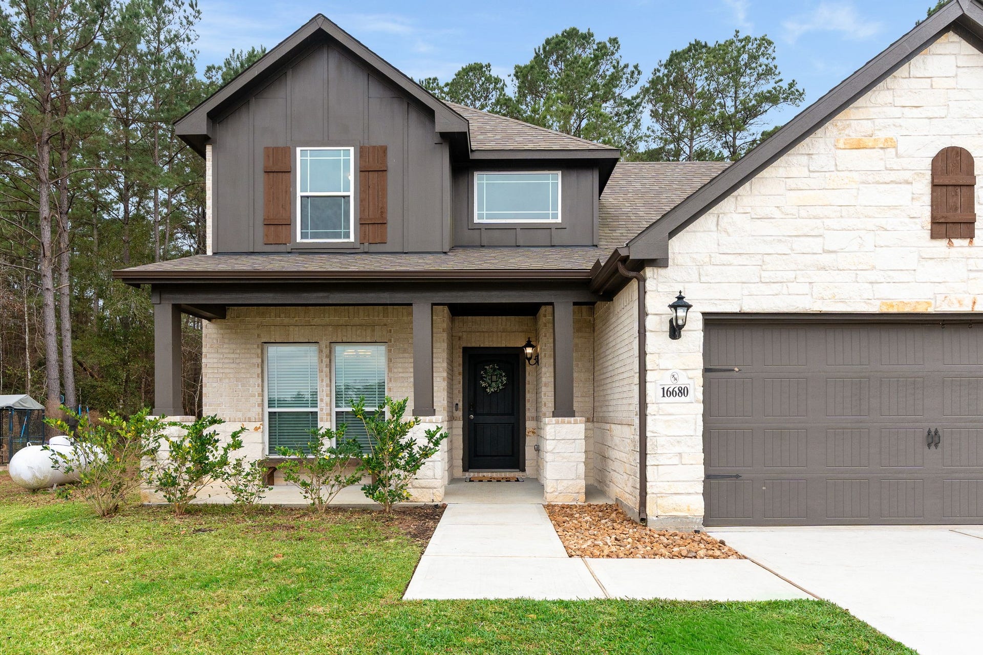 16680 Rockwall Street, Conroe, TX 77303 Upgrades also include front gutter and front sprinkler system.