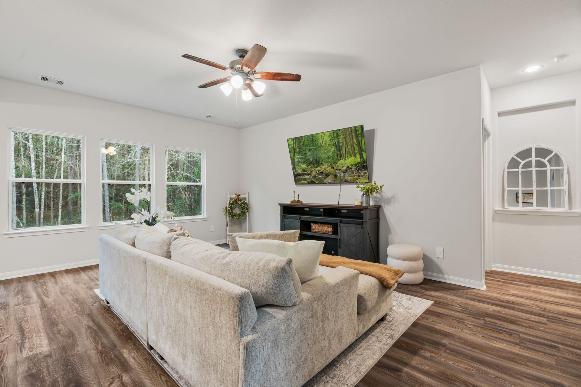 16680 Rockwall Street, Conroe, TX 77303 enjoy the extra privacy this lot offers with beautiful woods located behind it.