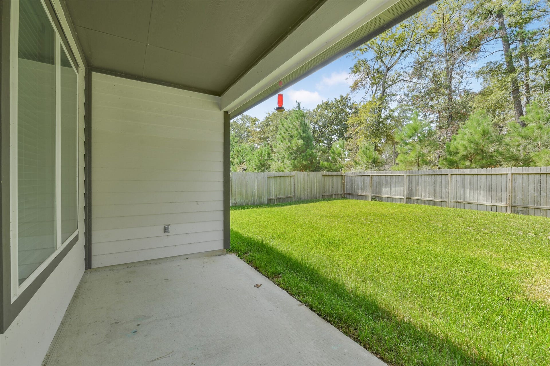 14322 Winema View Lane, Conroe, TX 77384 Covered patio and big back yard backing to a green belt.