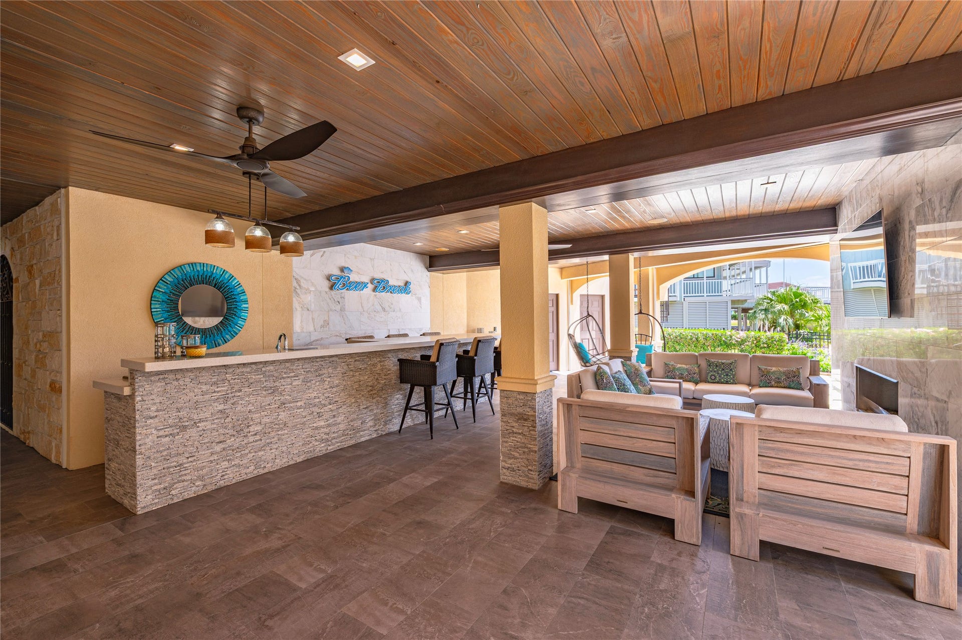 215 Sampan Drive, Galveston, TX 77554 Screened porch and bar