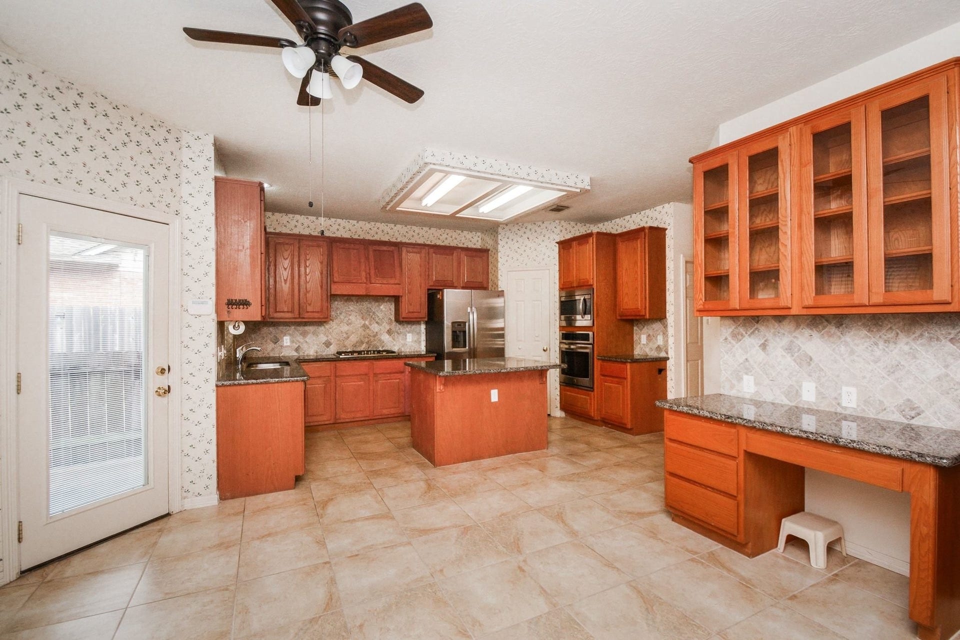 17122 Highland Canyon Drive, Houston, TX 77095 Open concept kitchen with desk area