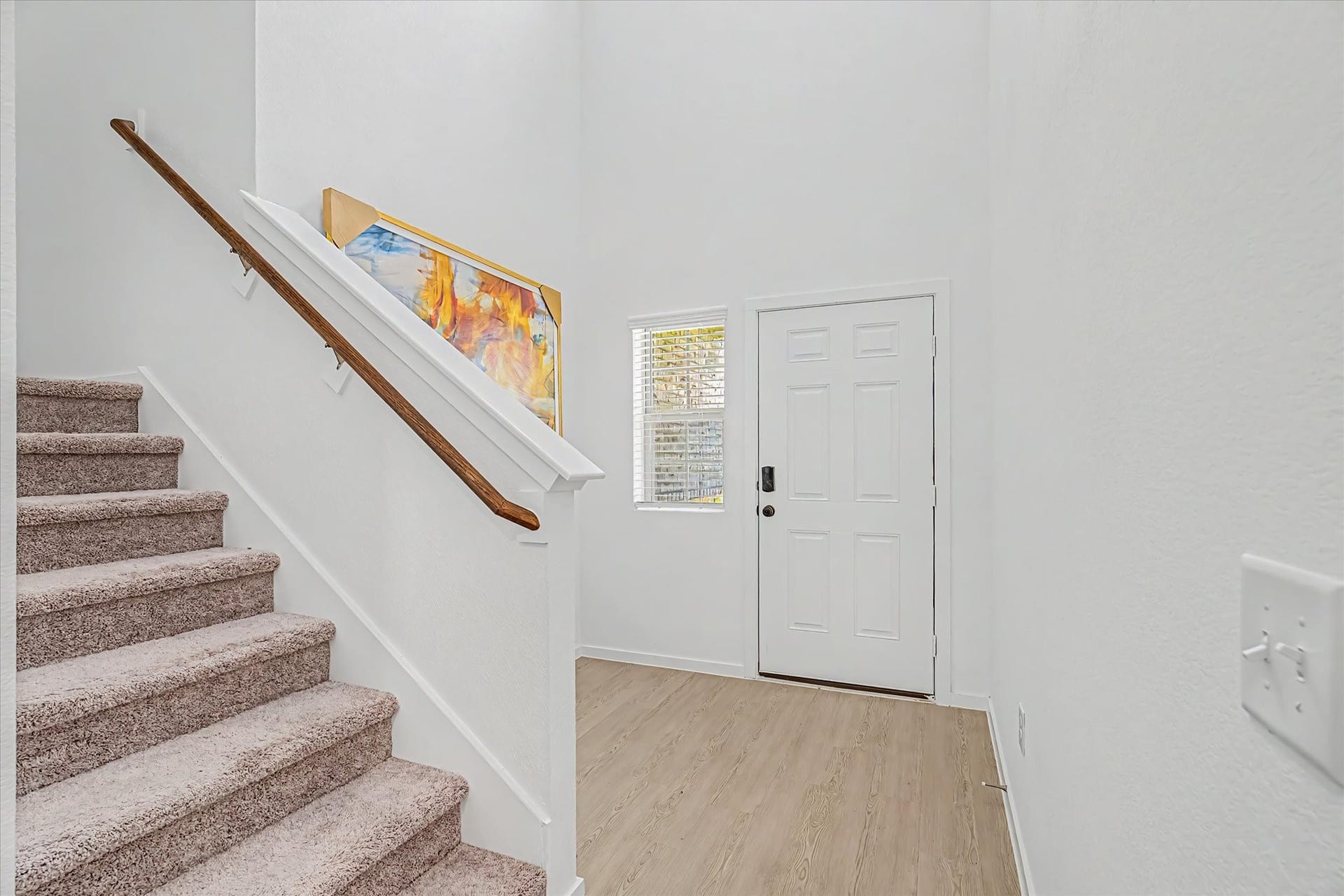 Entry Foyer then the stairs lead to the 2nd story