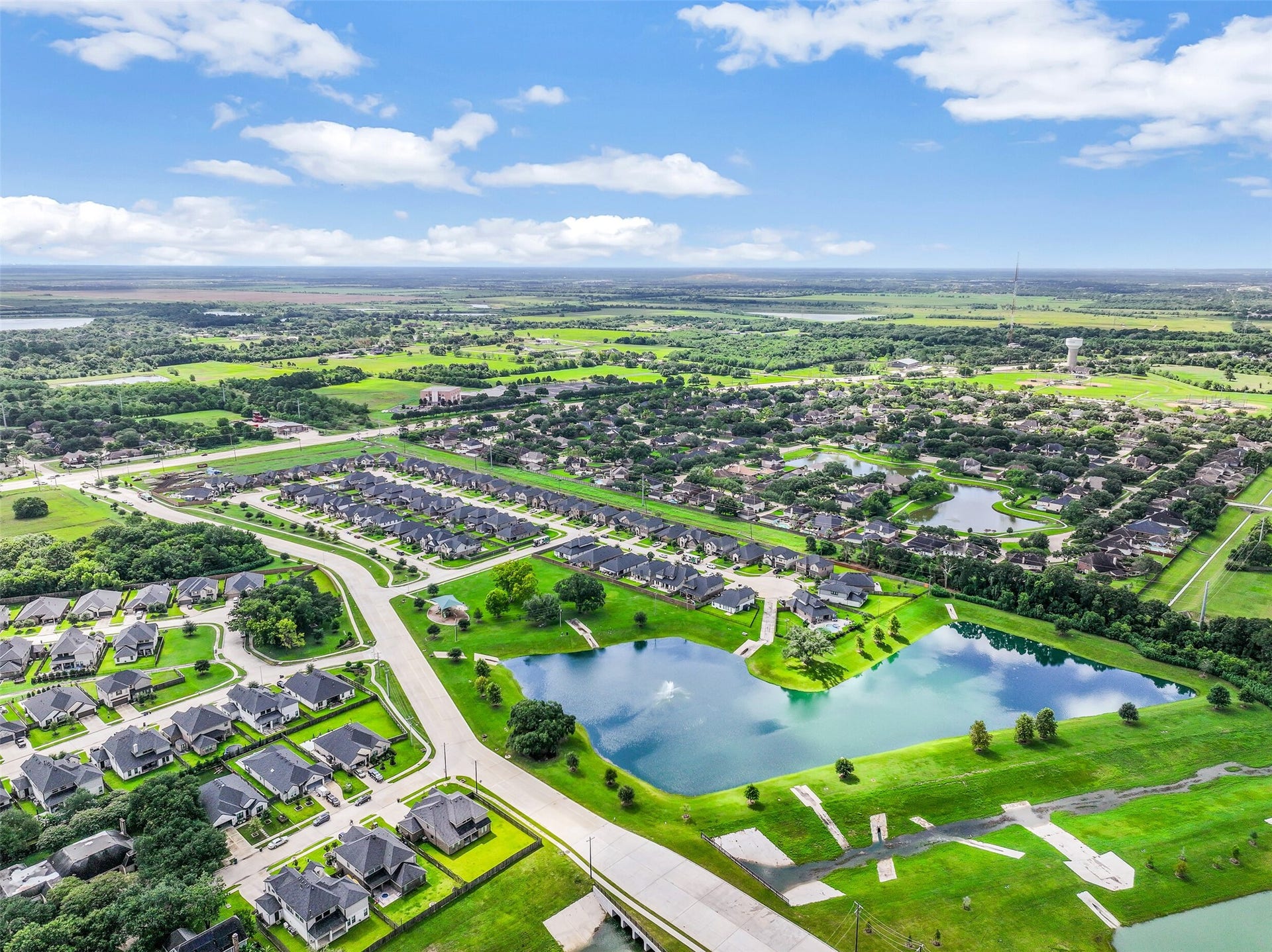 1570 Mustang Trail, Friendswood, TX 77546 Friendswood Trails combines newer homes with expansive green spaces, lakes, trails, and recreation, all within sought-after Friendswood ISD. This sweeping aerial captures the community setting and abundance of open space surrounding the neighborhood.