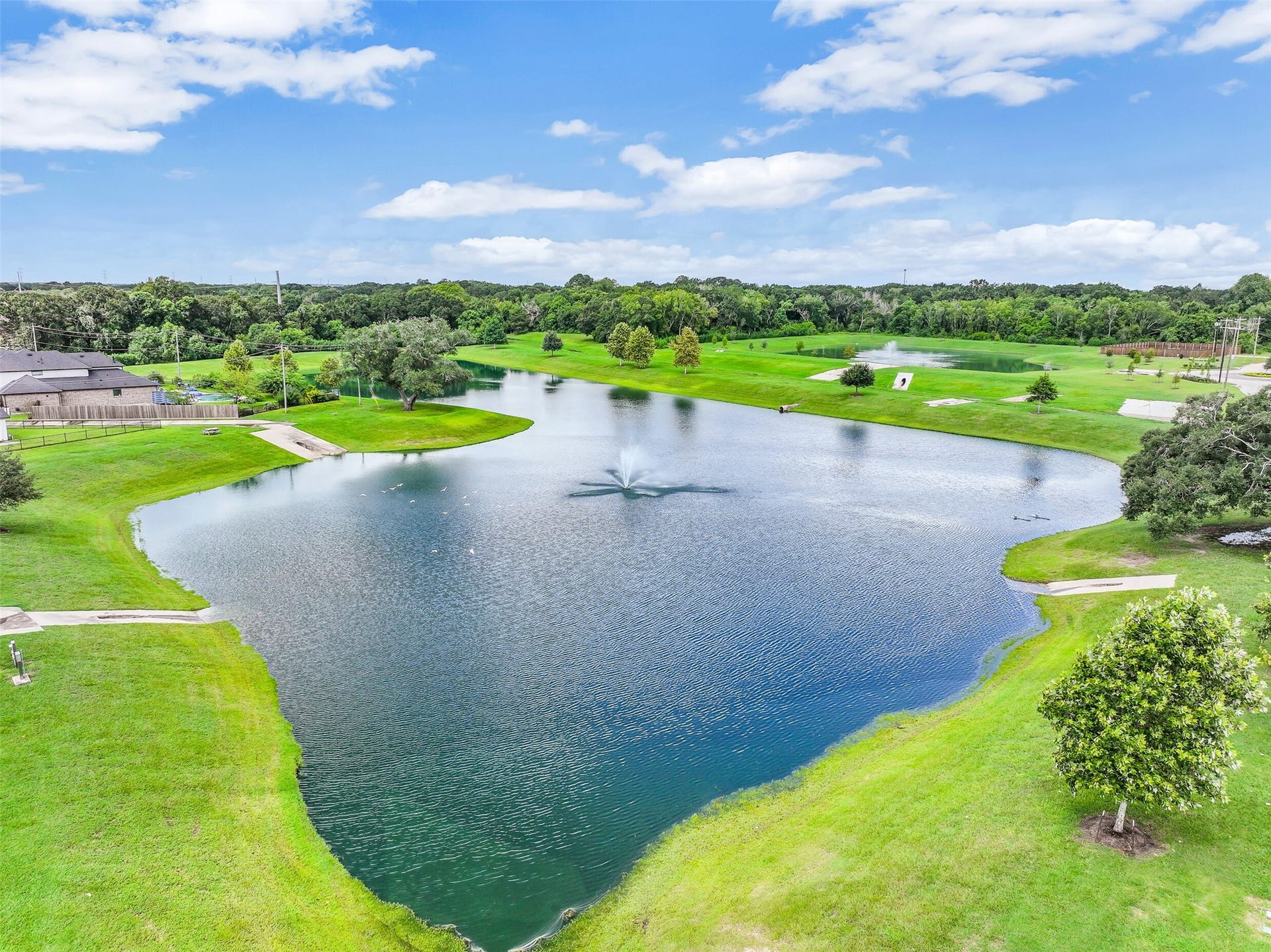 1570 Mustang Trail, Friendswood, TX 77546 Enjoy the scenic side of Friendswood Trails with picturesque neighborhood lakes, fountains, expansive green space, and walking paths that provide a peaceful backdrop for an evening stroll or time outdoors close to home.
