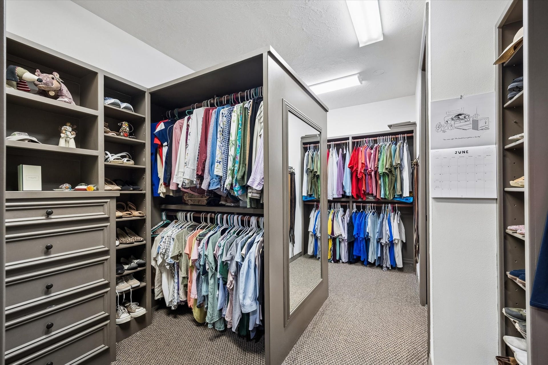 Now THIS is a closet! The Master Closet features copious amounts of hanging space, shelves and dressers.  Think of the fun you'll have stocking this Closet!